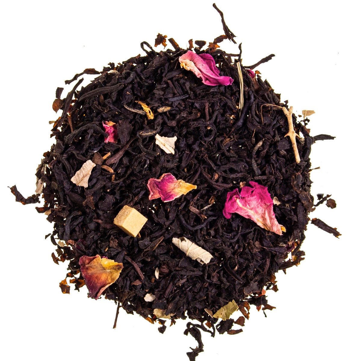 Loose‑leaf Canberra Breeze tea from Adore Tea, featuring black tea leaves, caramel chunks, dried blackberries, and rose petals, displayed on a light background to highlight its sweet and floral ingredients.