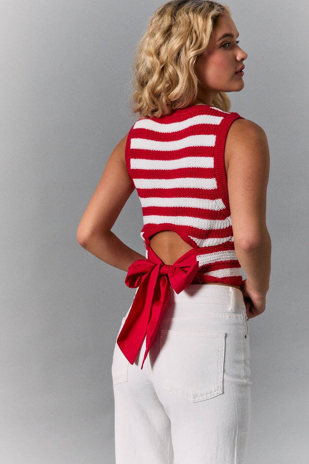 BACK BOW DETAIL SLEEVELESS STRIPED SWEATER TOP — Bama Tan boutique, Tuscaloosa AL