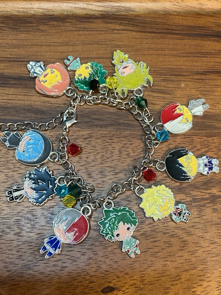 Hero Academy Themed Metal Charm Bracelet
Bracelet is 8" Long