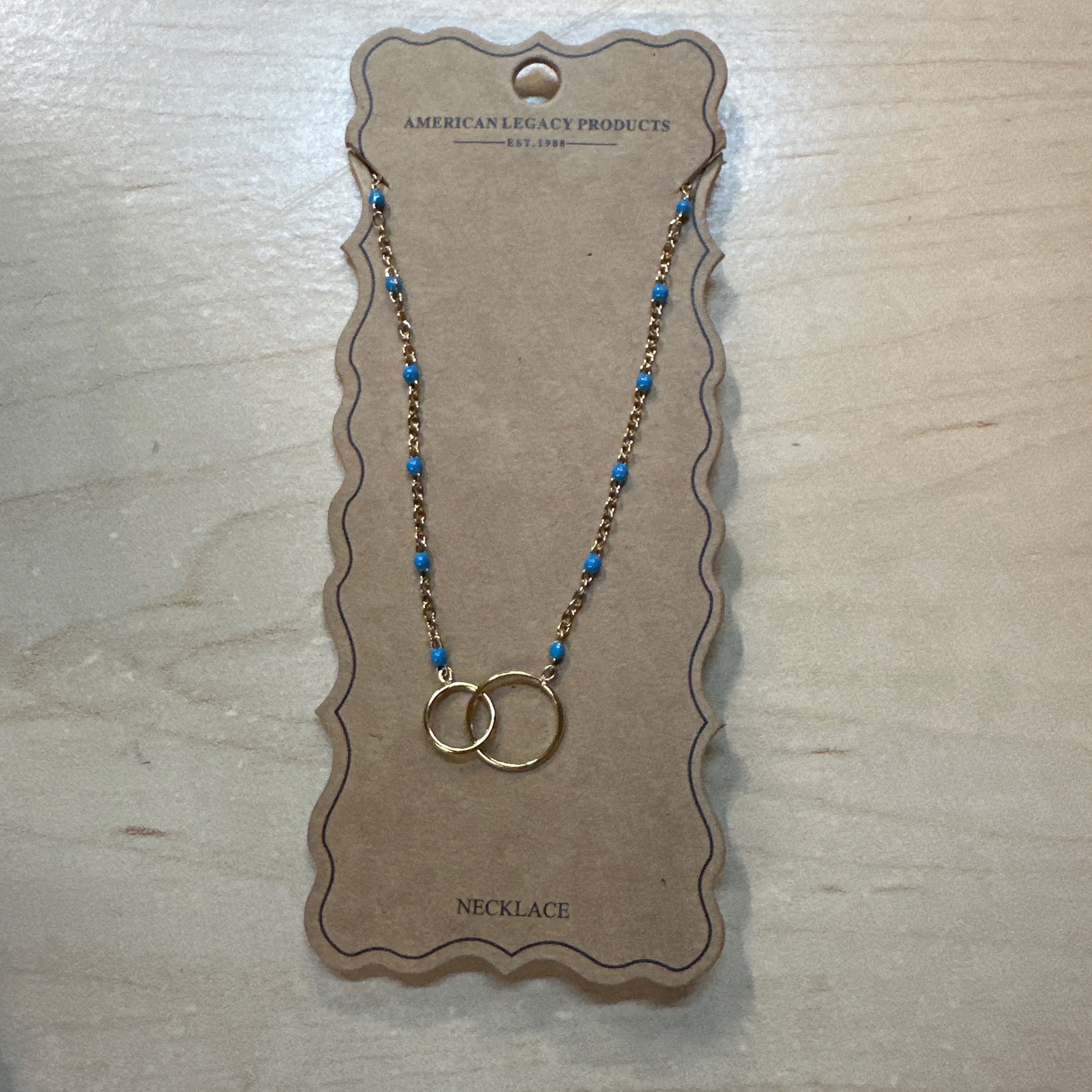 18K gld/s steel linking hoops necklace