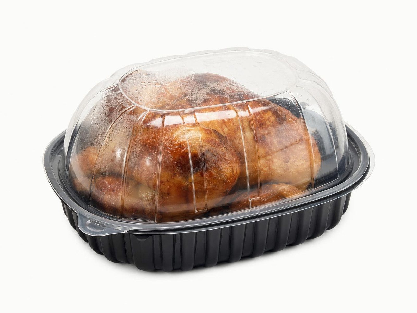 Whole rotisserie chicken in a domed to-go container