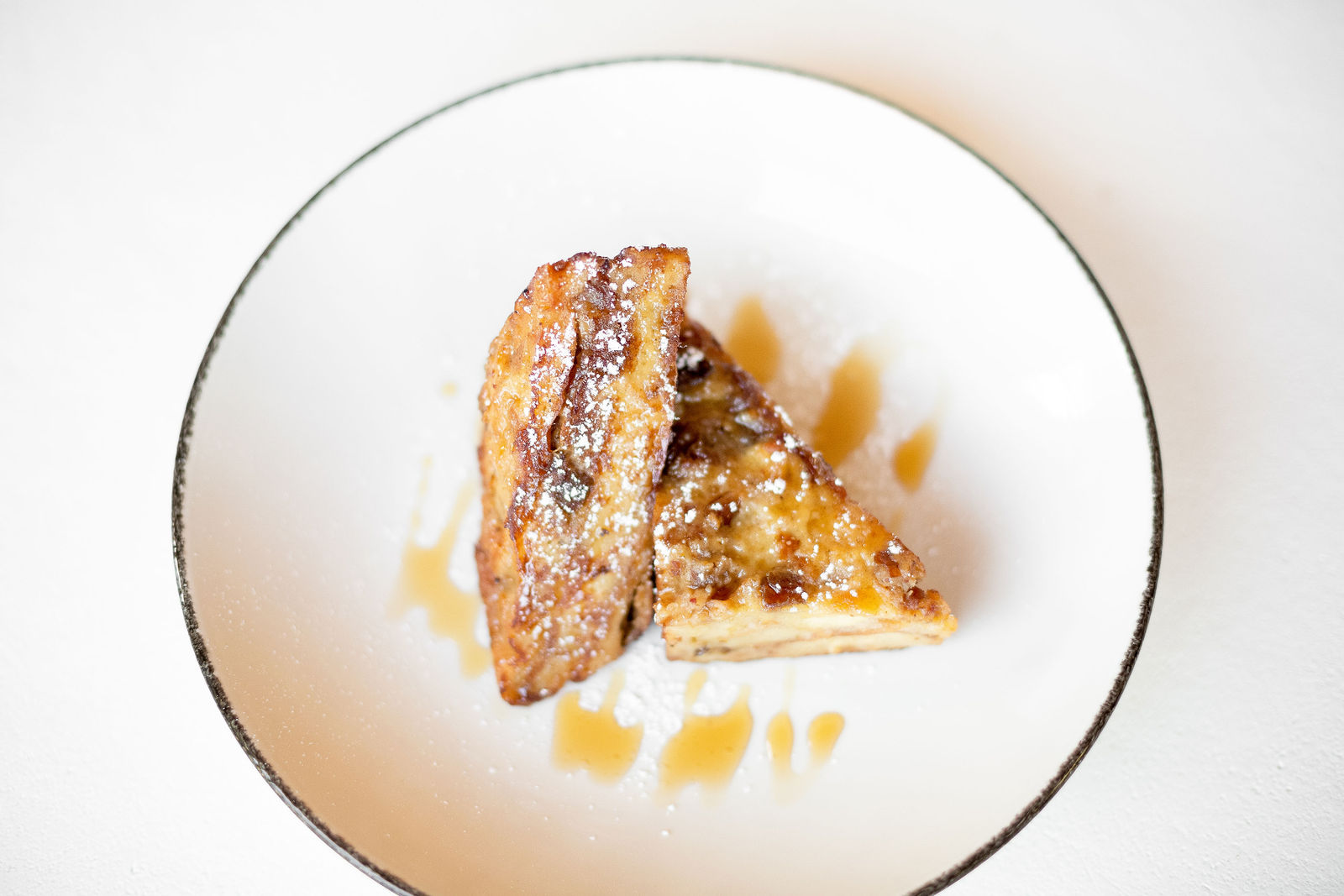 Bread Pudding French Toast — orange cardamom brioche, mejdool dates, organic maple syrup