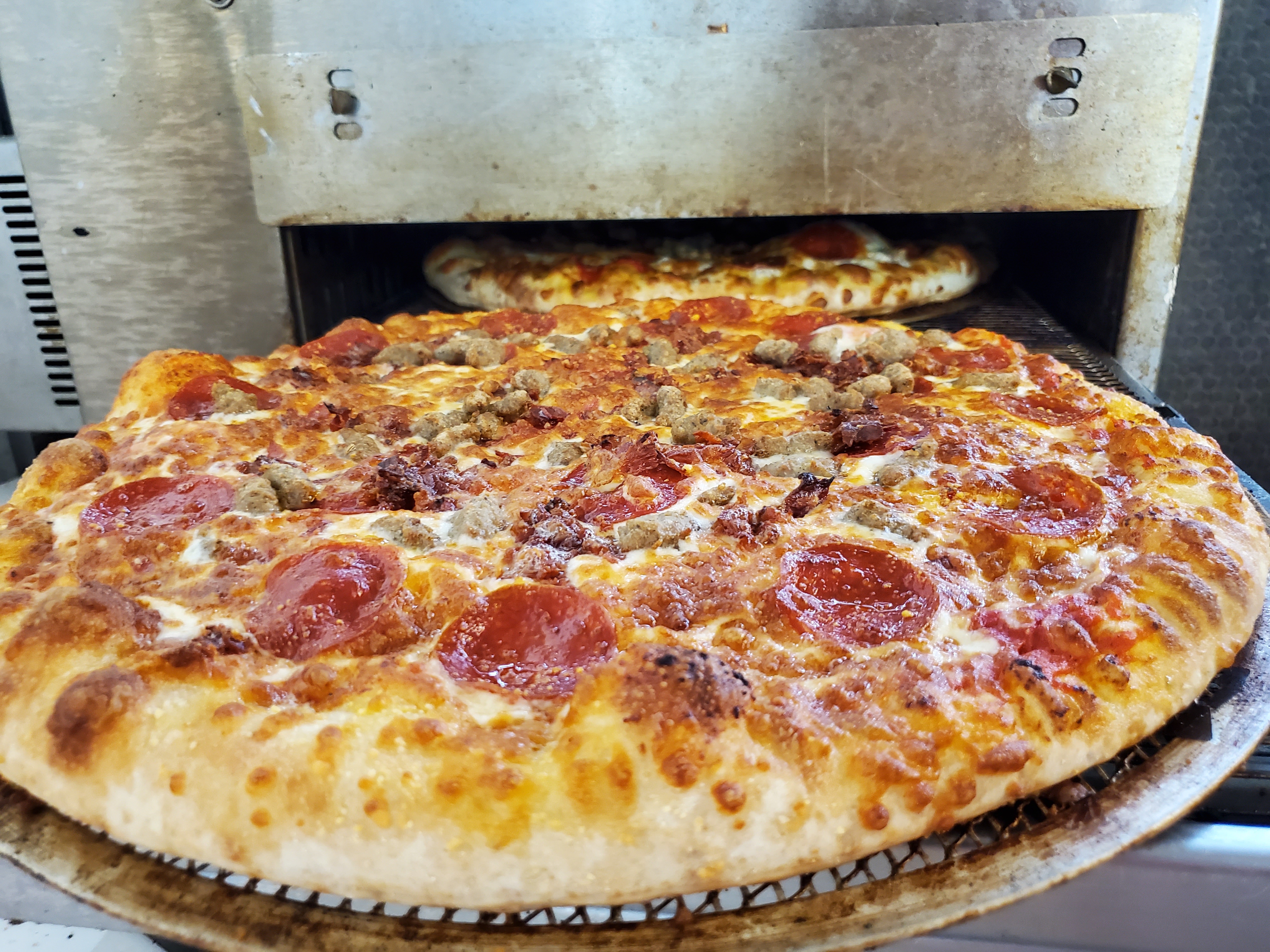 Two Meat Lovers at Dough Boys Pizza - Shreveport in Shreveport, LA 71104 | YourMenu® Online Ordering