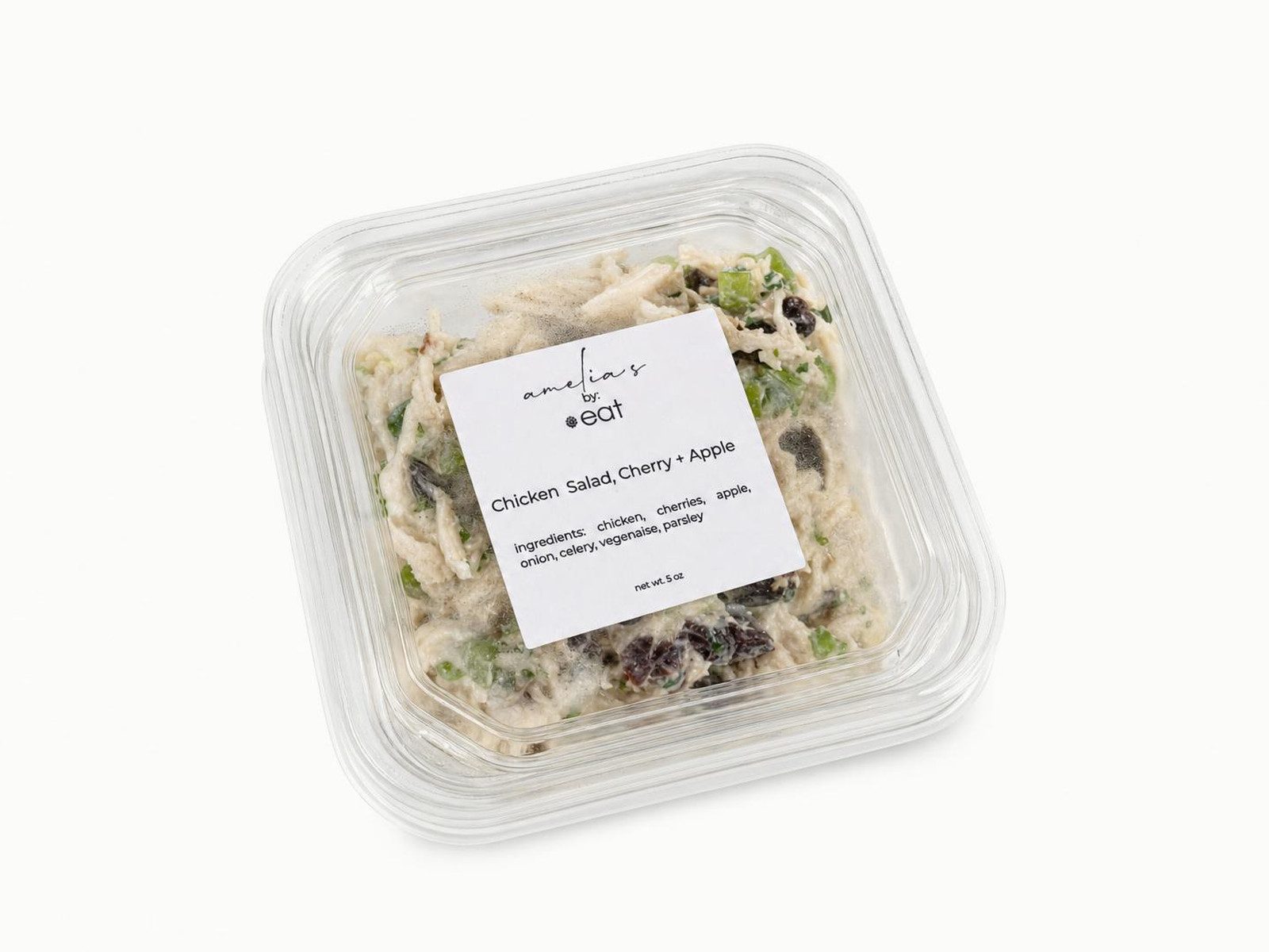 Amelia's chicken salad with cherries and apple in a clear to-go container