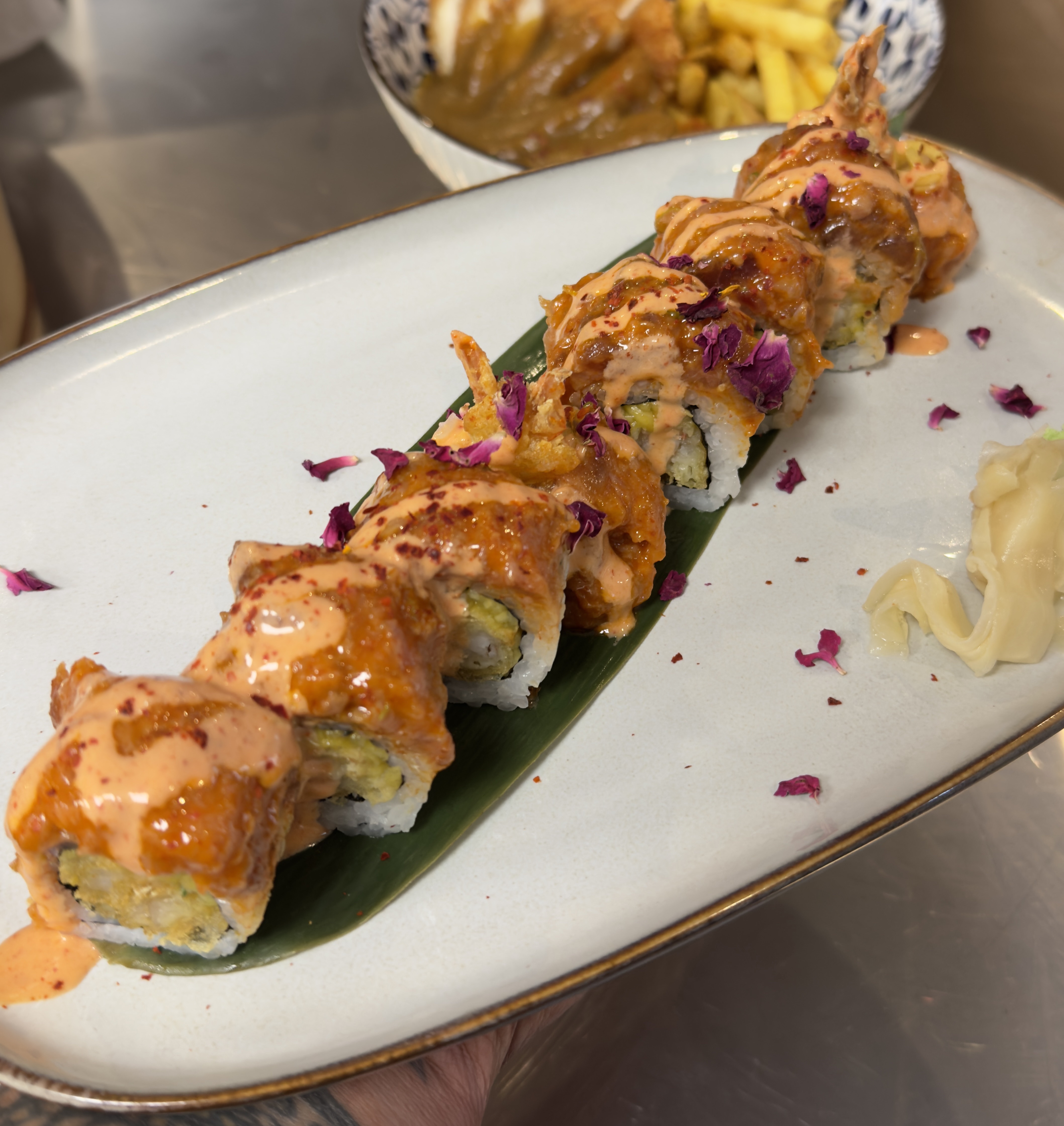 Click to view Flaming Hottie Flaming Hottie - crispy prawn and mango centre, crowned with spicy
