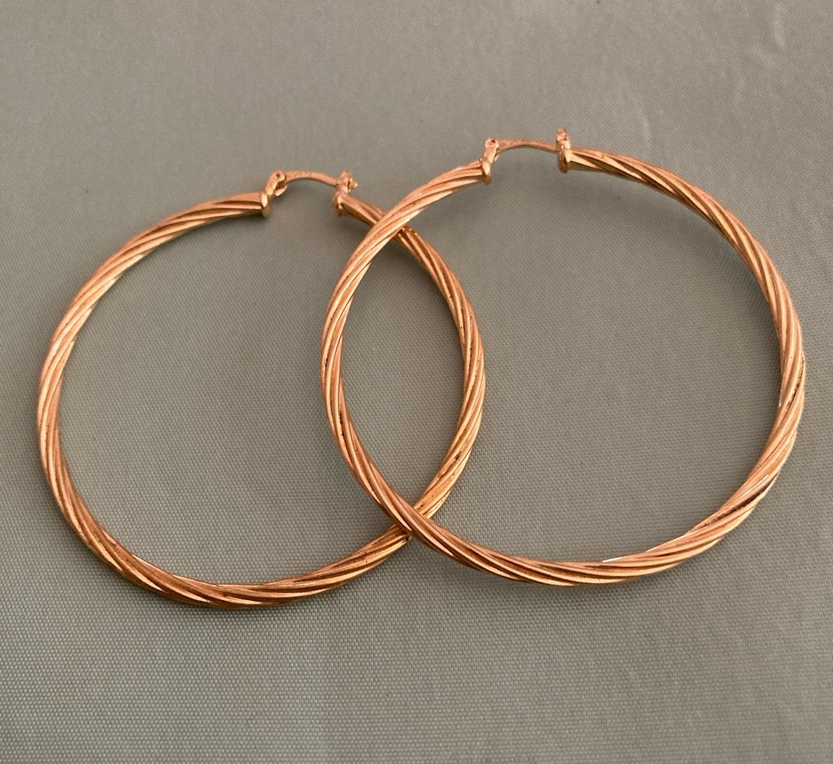 TWISTED HOOP LARGE GOLDTONE HOOP EARRINGS Signed GUYMY