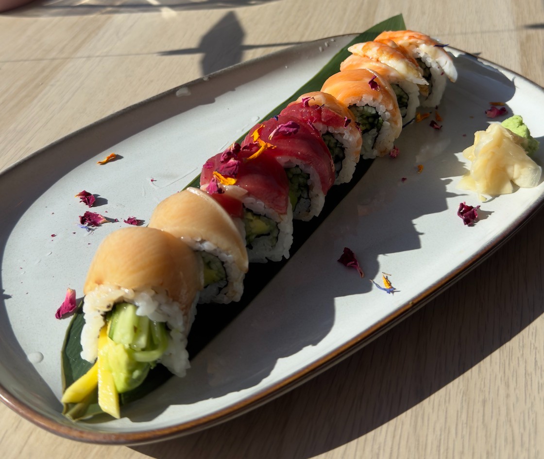 Click to view Niji Roll Niji Roll - cucumber, mango and avocado filled, topped with sa