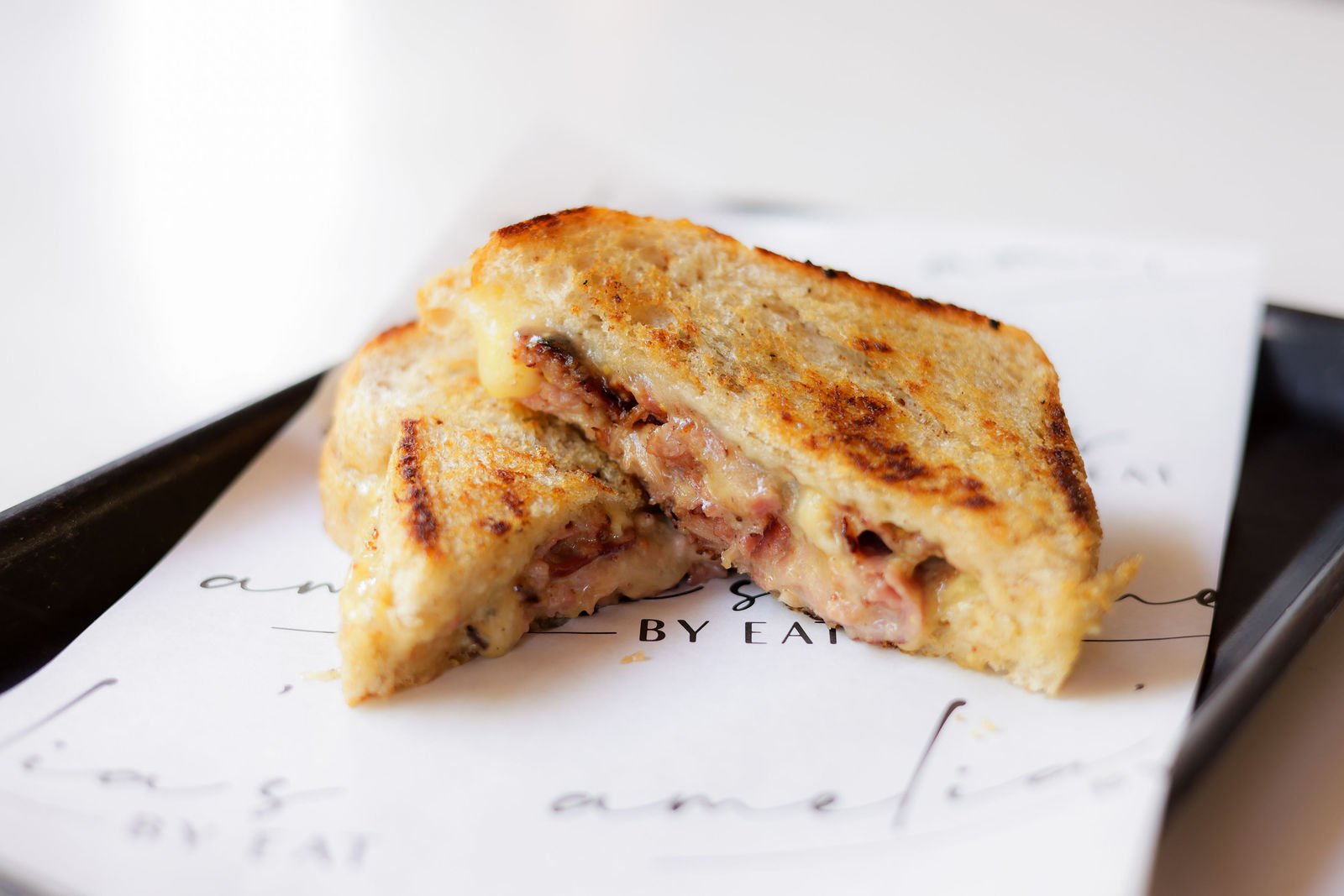 Hot Ham + Cheese Sandwich — Fra’mani sweet apple ham, honey horseradish mustard, white cheddar, homestyle white *add egg (3)