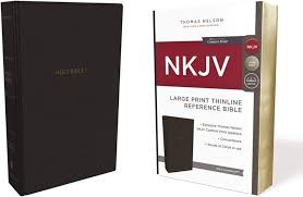 NKJV, Thinline Reference Bible, Leather-Look, Black, Red Letter, Comfort Print: Holy Bible, New King James Version by Thomas Nelson