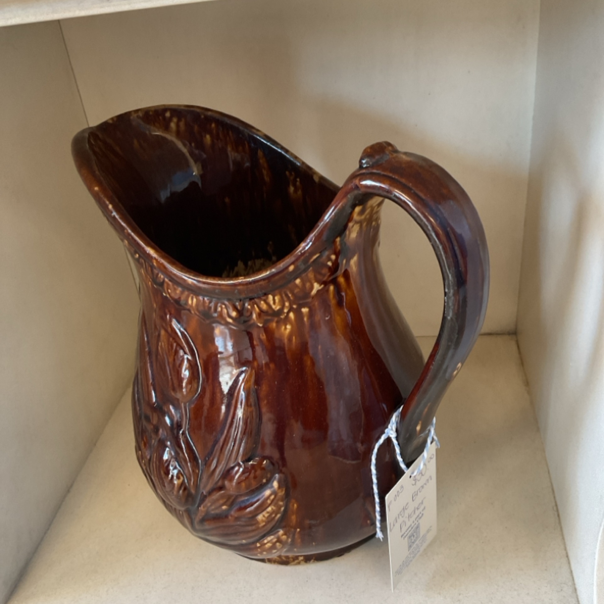 Large brown pitcher