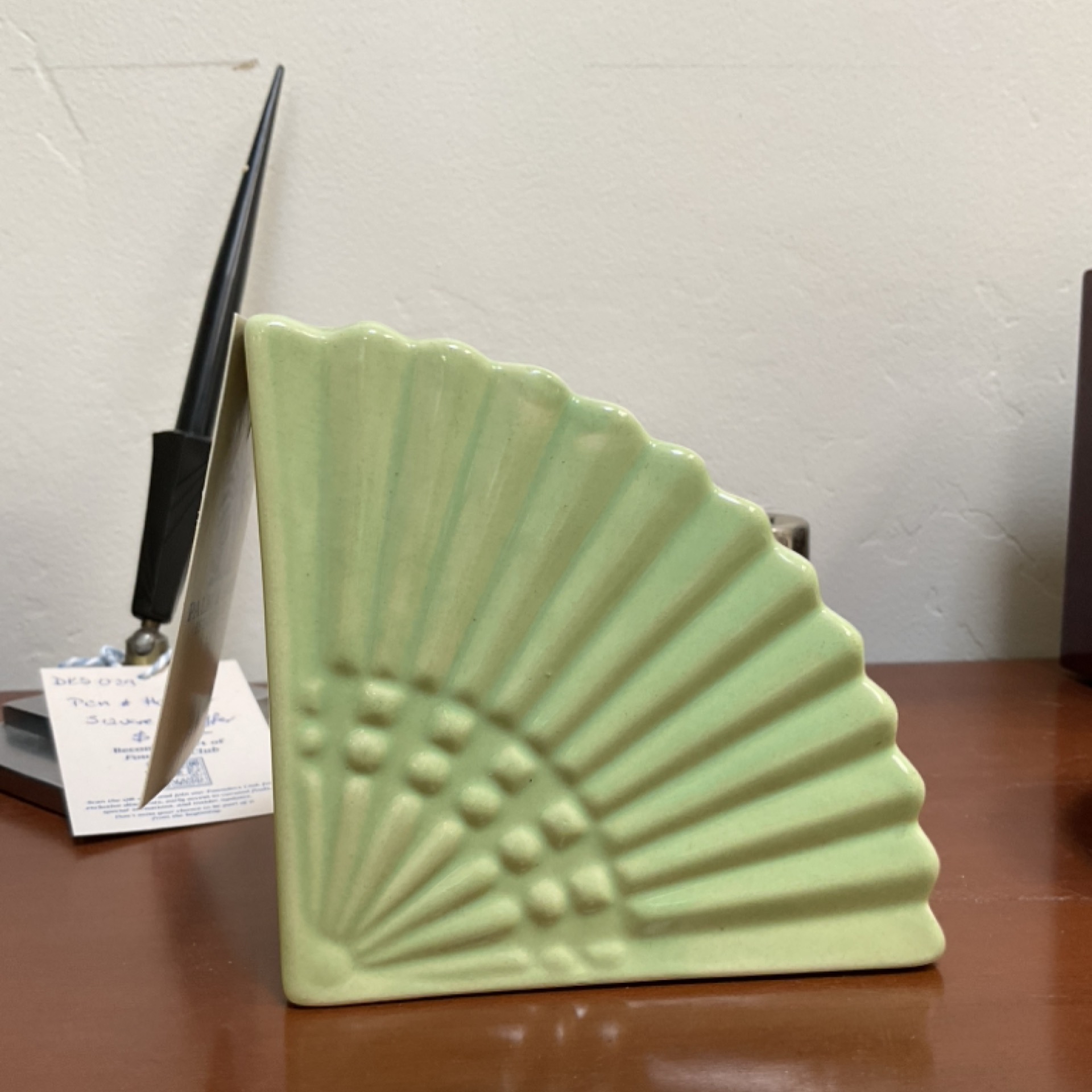 Green ceramic fan vase