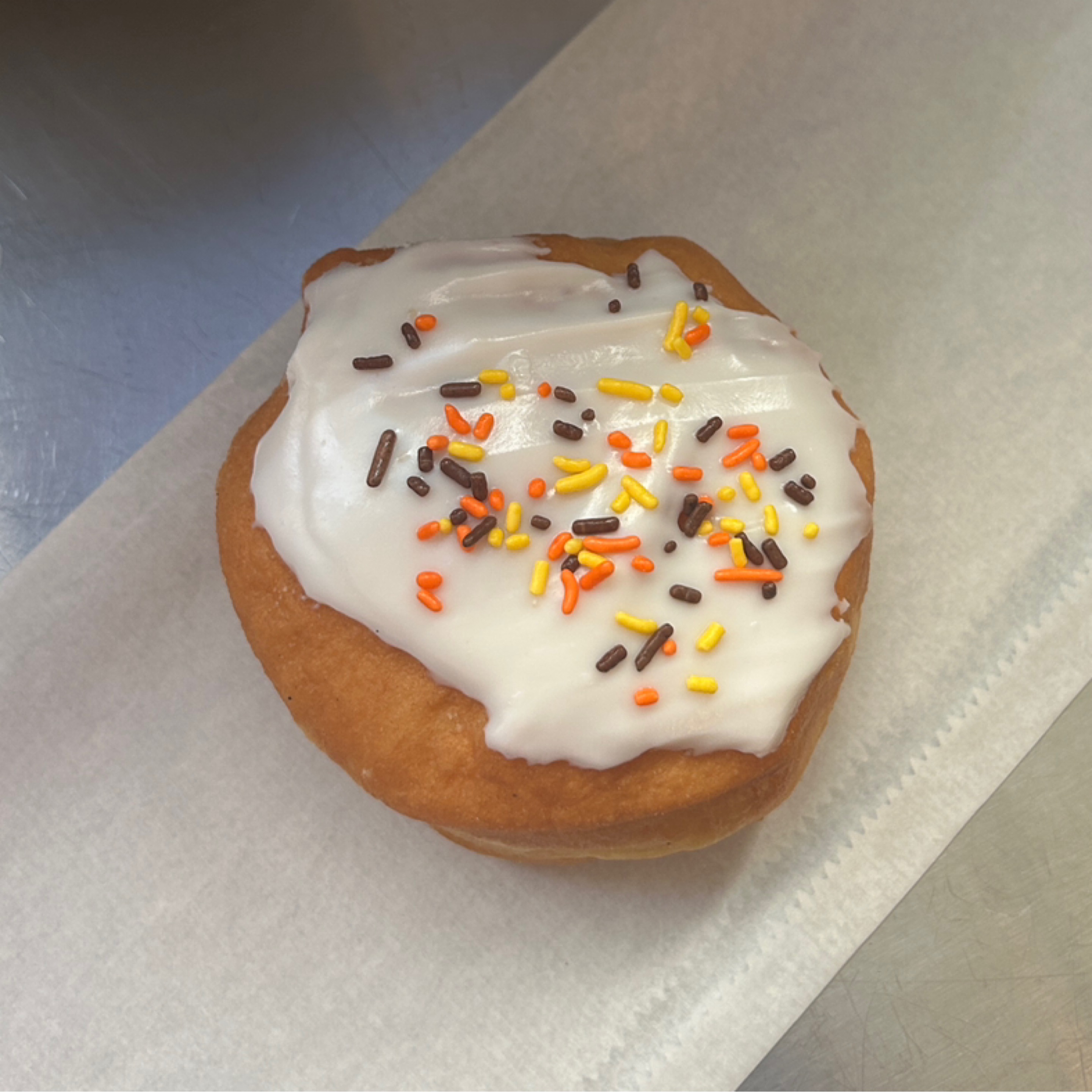 Vanilla Cream Filled with Sprinkles Donut