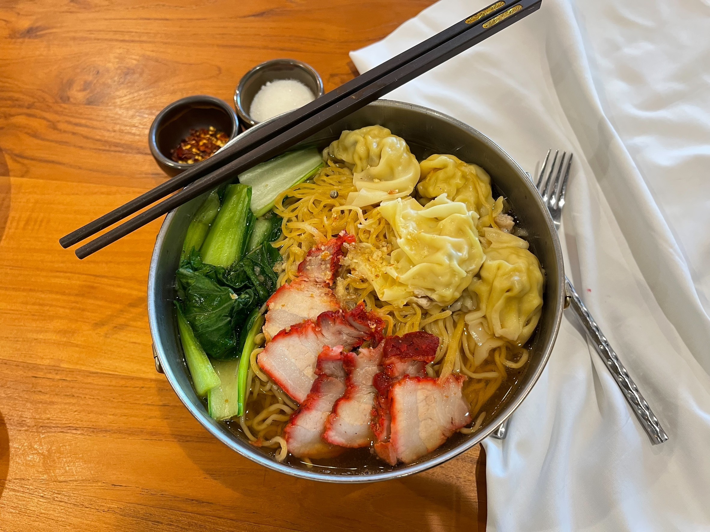 Seafood wonton noodles soup with bbq pork
