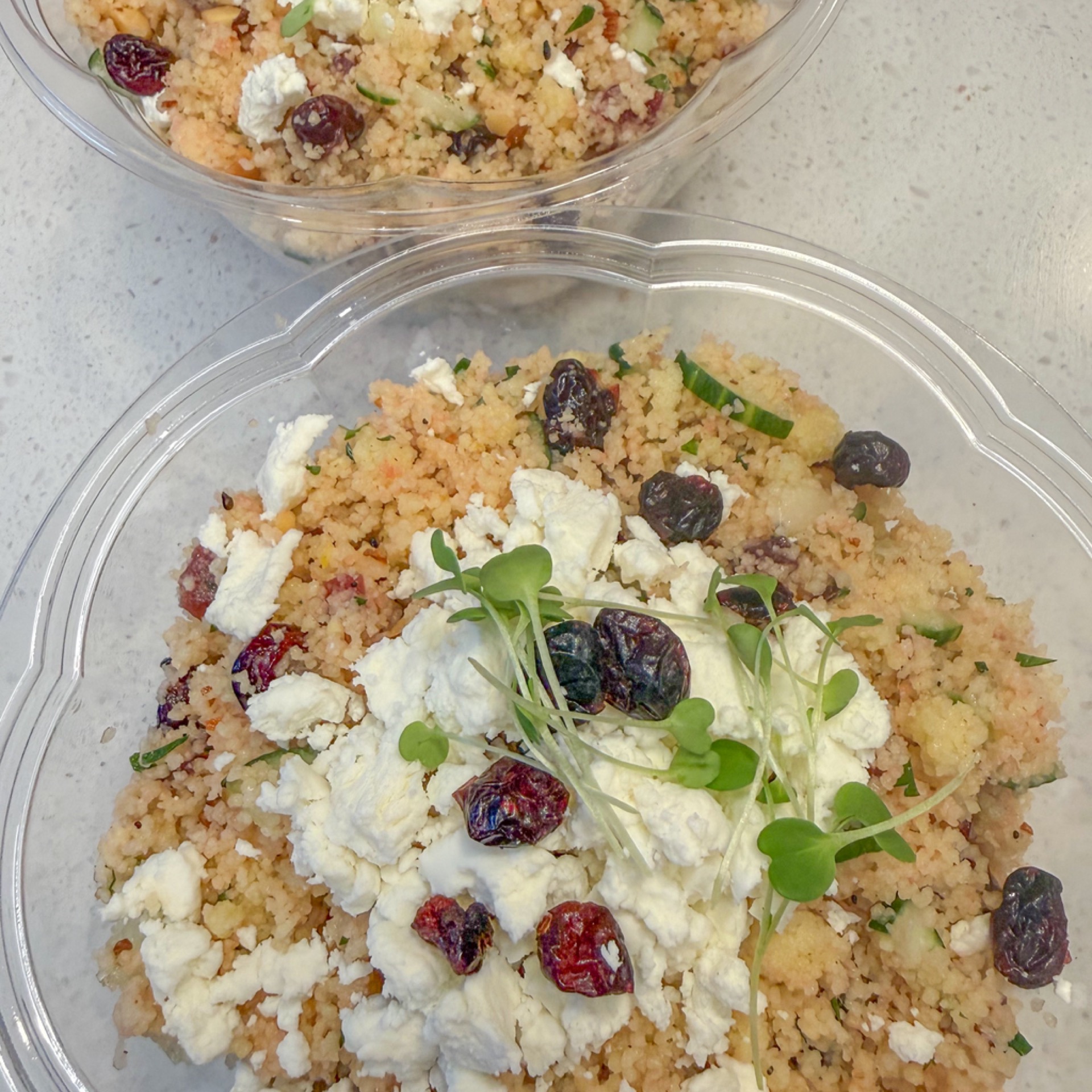 Creamy couscous salad with lemon, cranberry, feta, cucumber and sunflower seeds