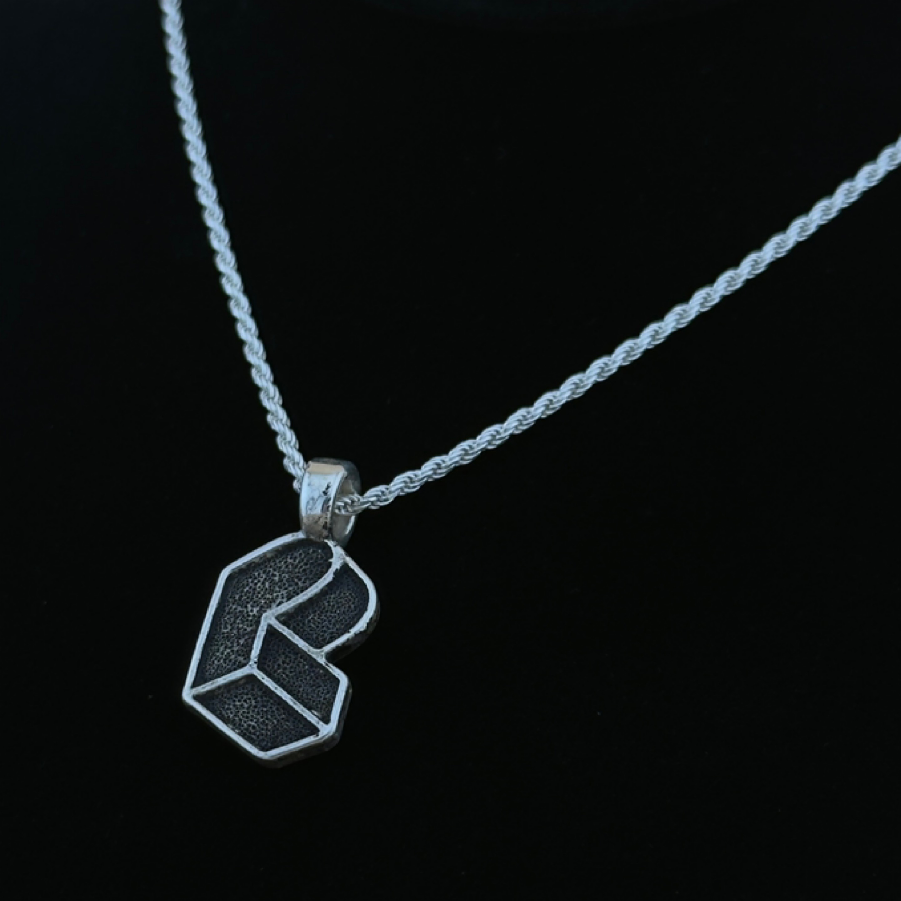Pretty Lights New Era Logo Pendant – Stippled / Tarnished, 925 Sterling Silver