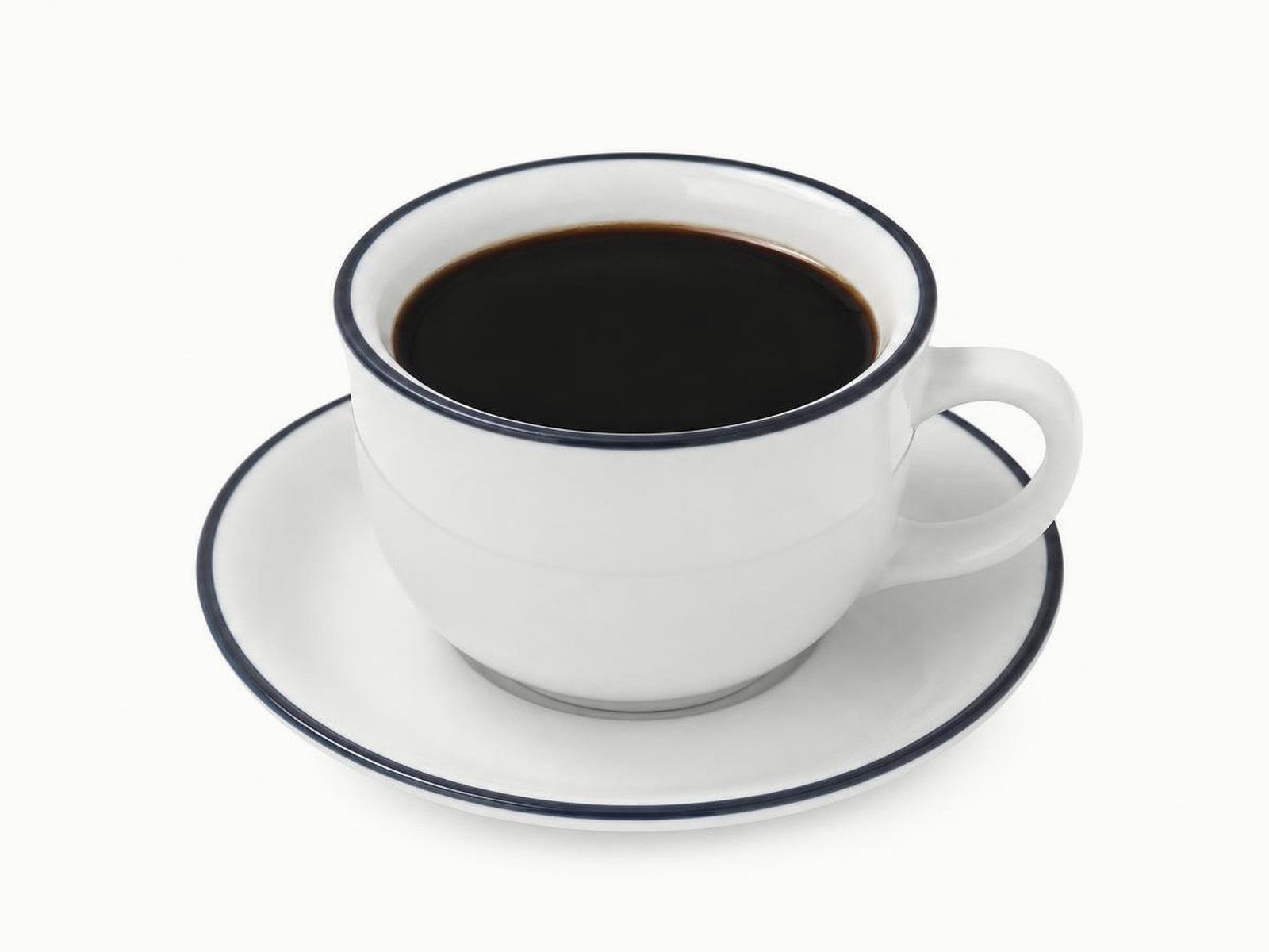 Americano in a white cup and saucer with a navy rim
