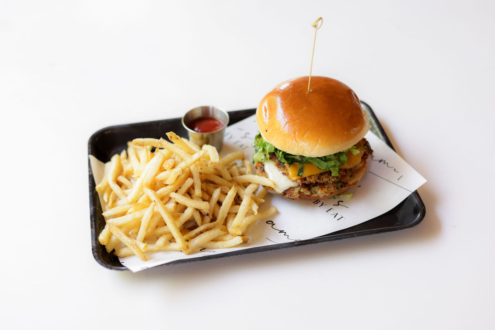 Quinoa Veggie Burger + Beef Tallow Skinny Fries — Double stacked quinoa veggie patties, american + swiss cheeses, tomato