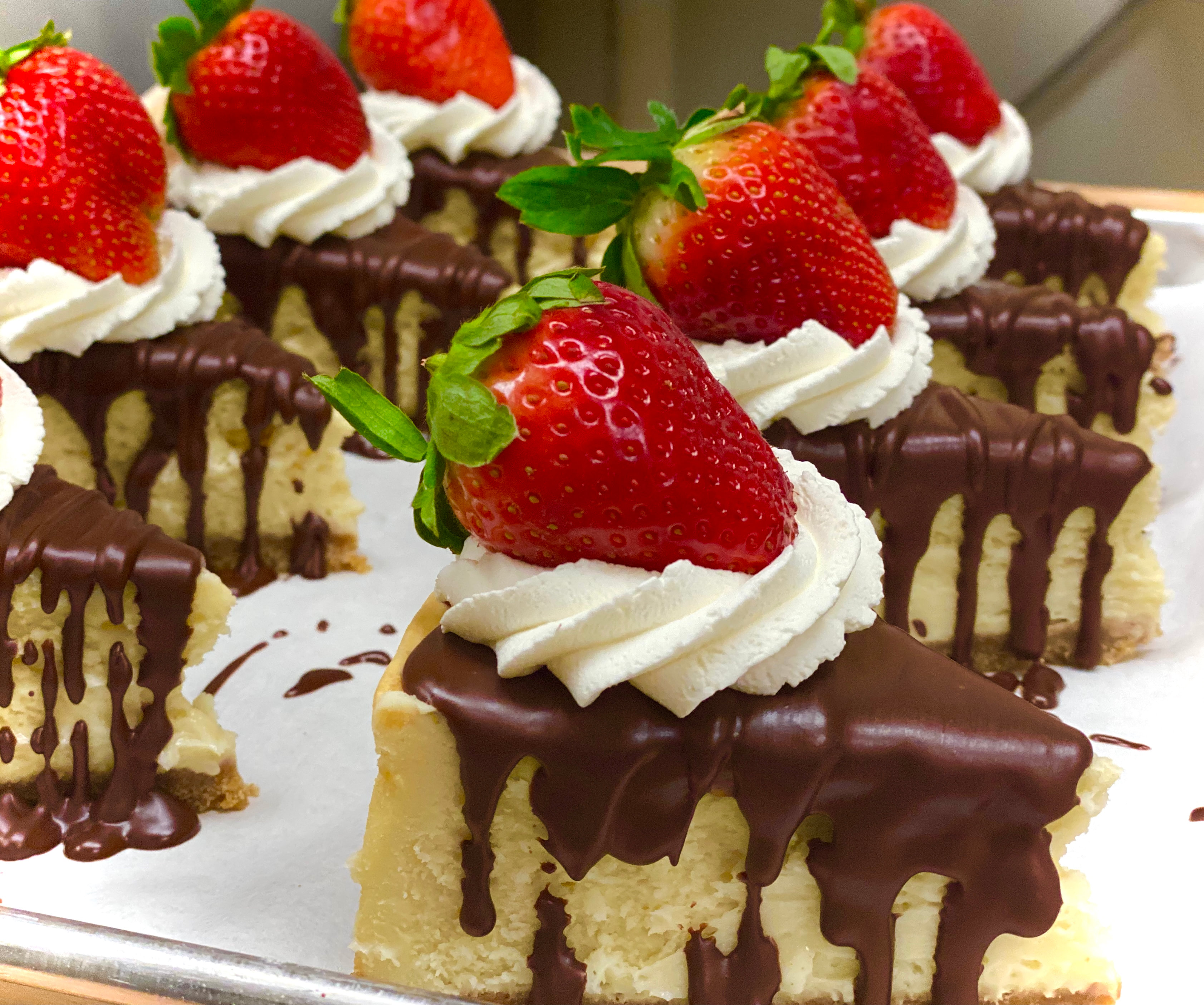 Chocolate Drizzled Cheesecake with Strawberries