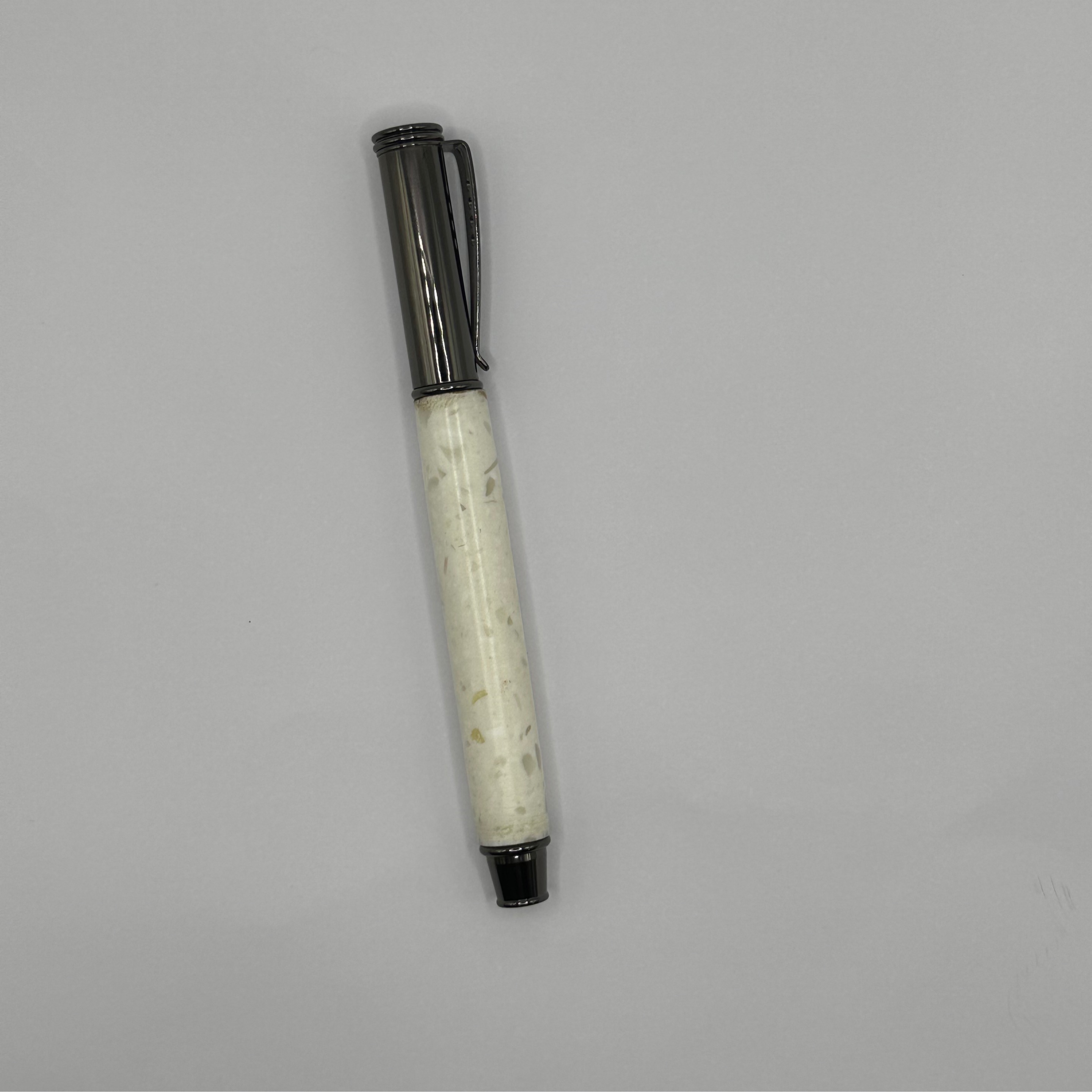Pen made with acrylic grip. Glows blue in the dark.