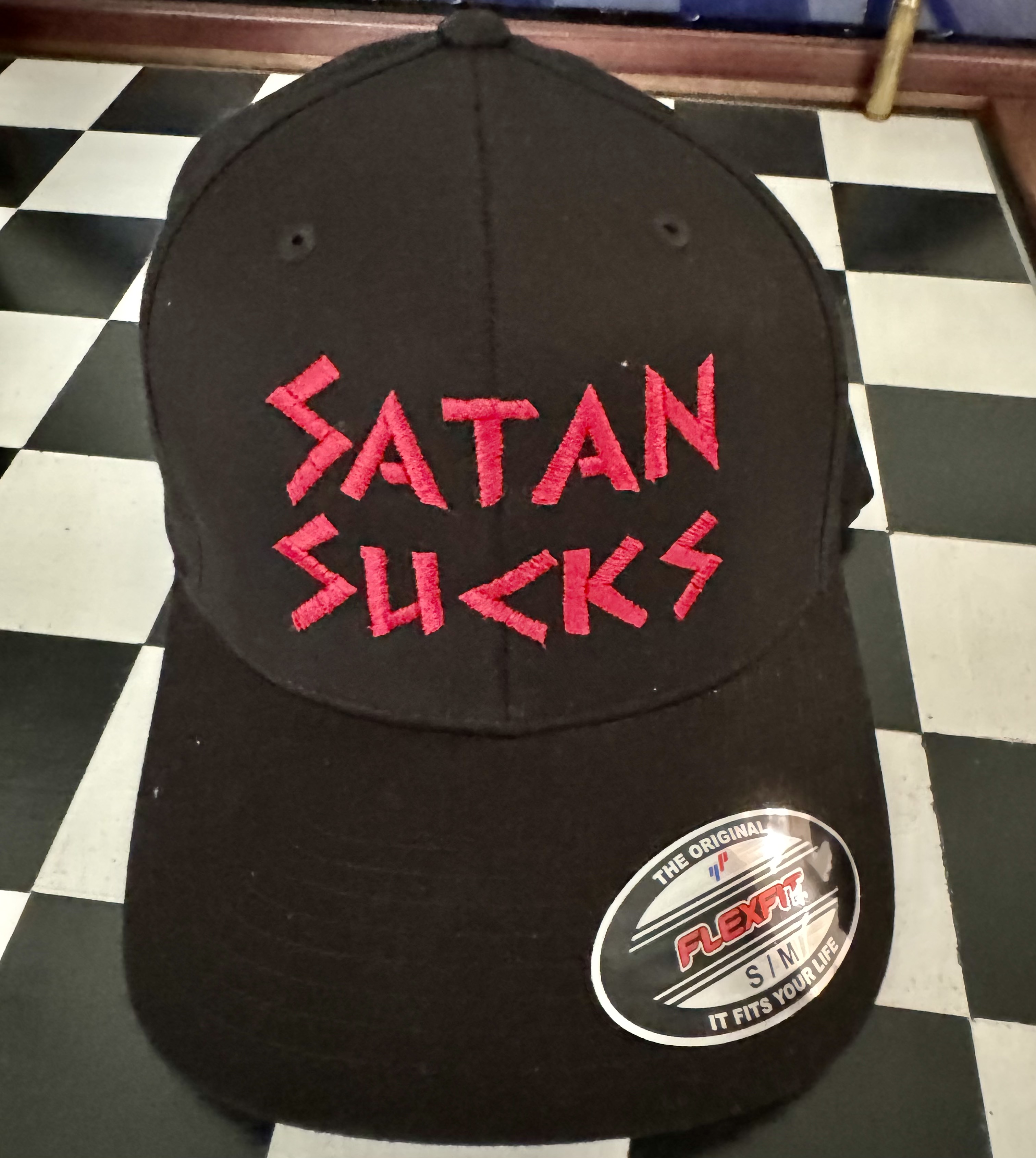 Satan Sucks cap, with modern font