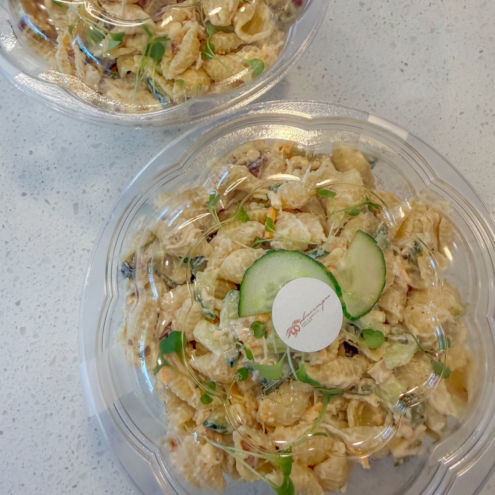 Pasta salad with Caesar mayo dressing, chicken, bacon, zucchini, cheese and pickles