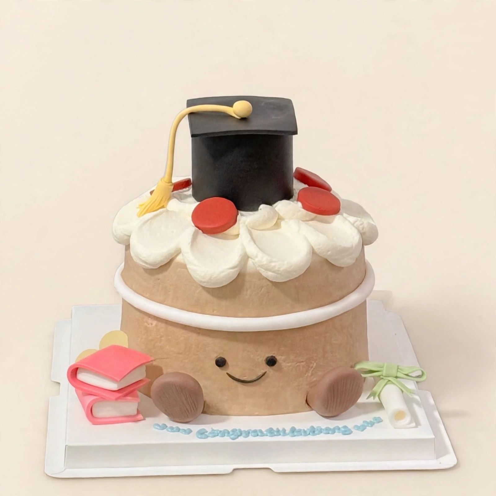Smiley graduation cap cake, HoneyMe Bakery Bellevue