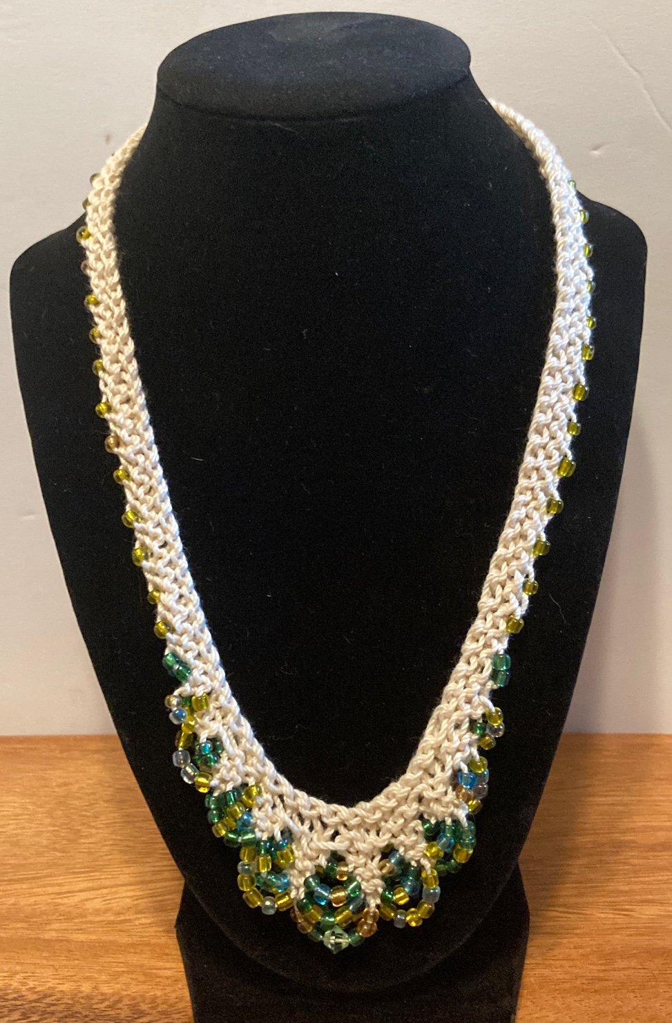 Crochet Necklace with yellow and green glass beads crocheted into necklace