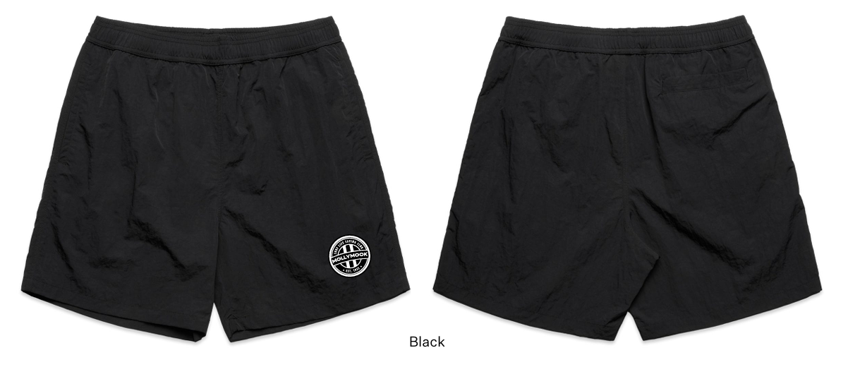 Front and back views of black Mollymook swim shorts with a circular club badge on the left leg.