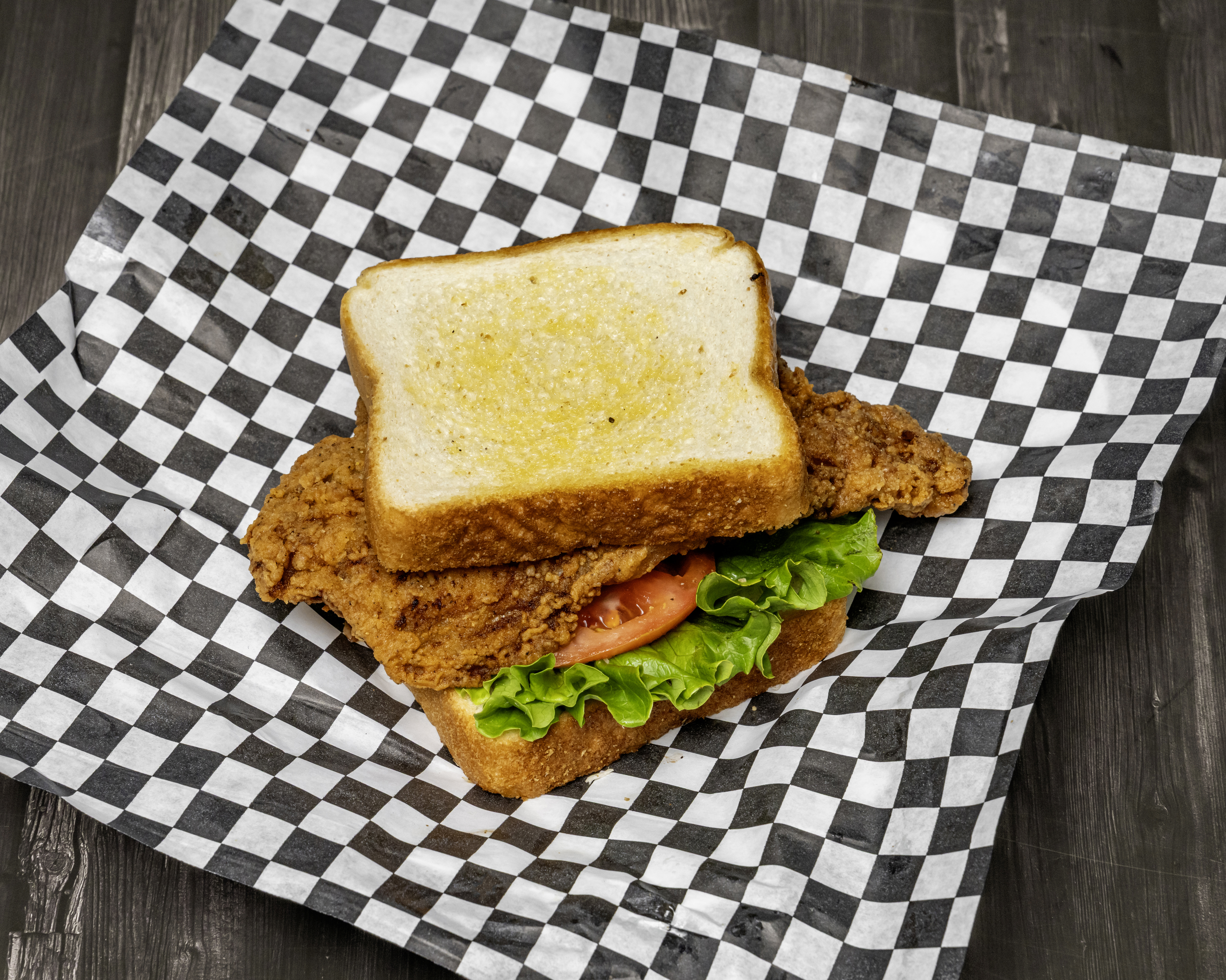 Pork chop Sandwich at Store Front Location  in Dallas, TX 75287-2608 | YourMenu® Online Ordering
