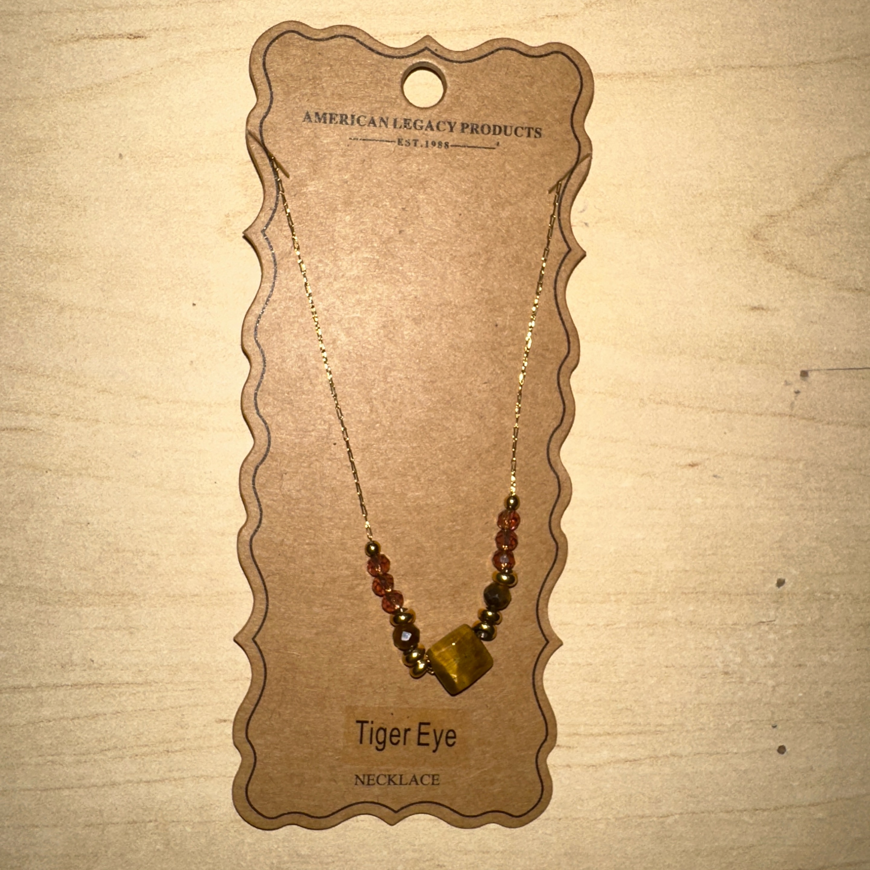 18K gld/s steel triple stone necklace