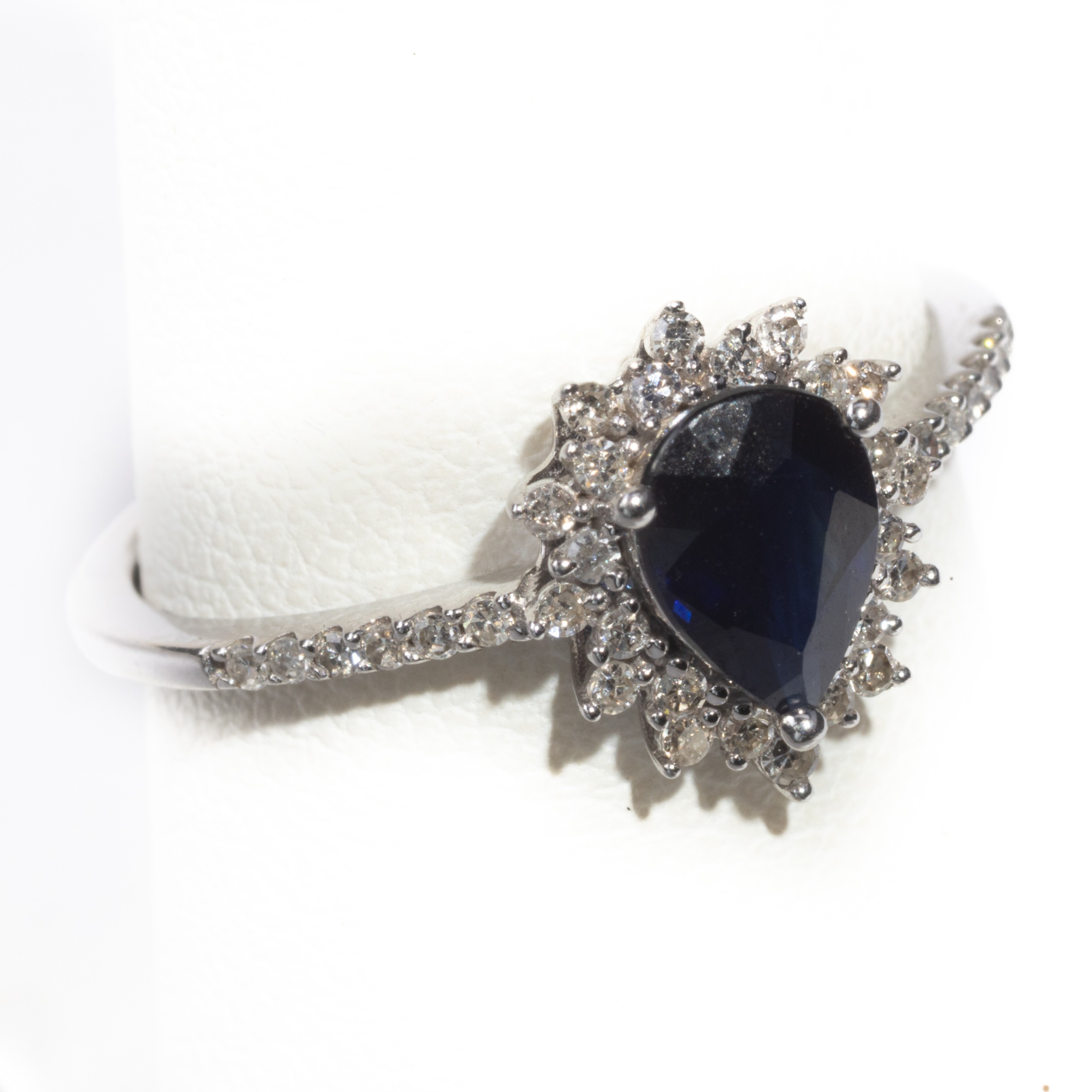 Pear Shaped Sapphire and Diamond set in 14 KT White Gold