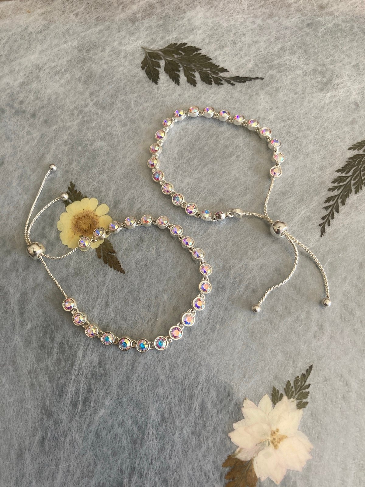 Two Irridescent Rhinestone Silver tone bracelets