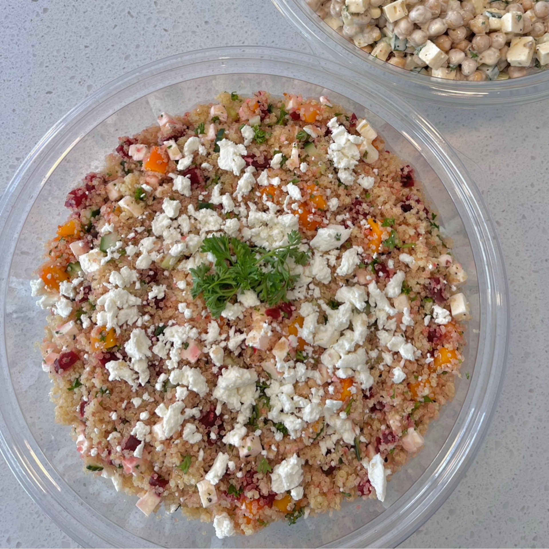 Couscous salad bowl with beets, butternut squash, cucumbers and goat cheese, homemade Dijon dressing
