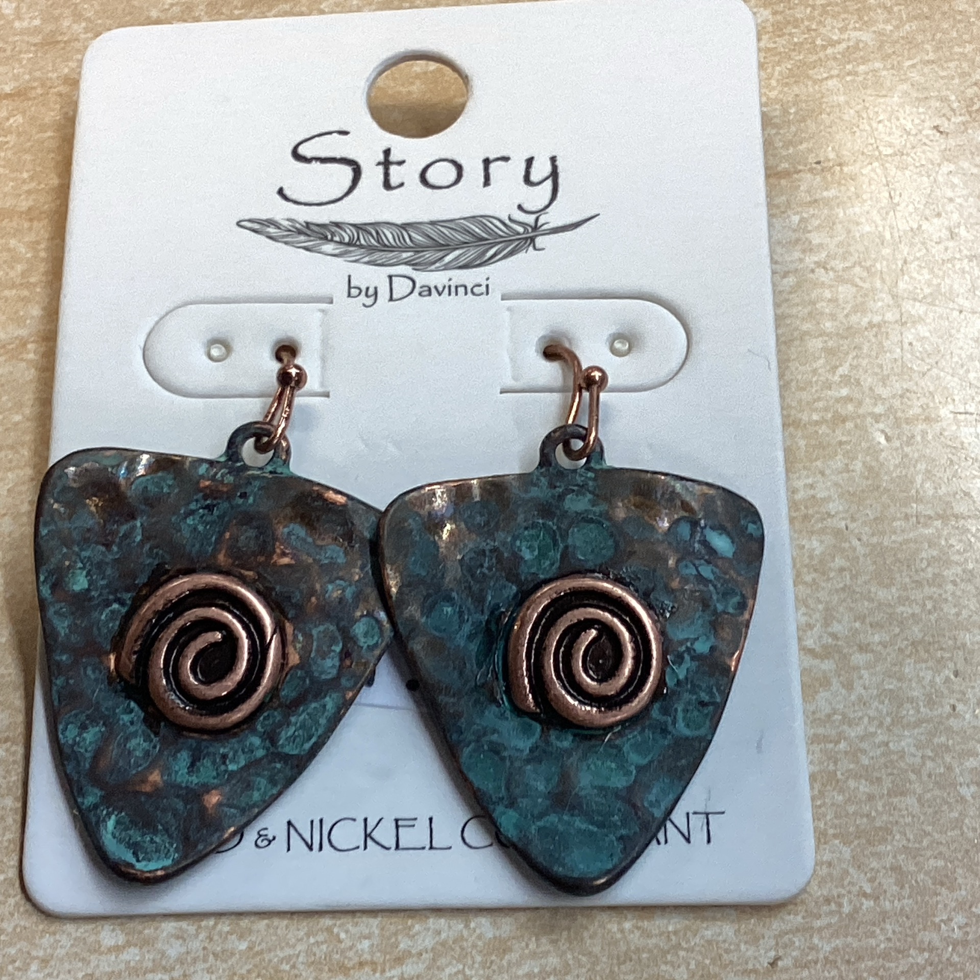 Arrowhead copper patina toned w/ copper swirl