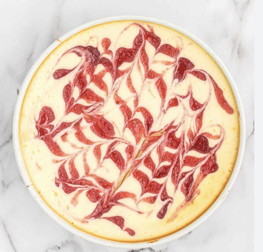 9" White Chocolate Strawberry Swirl Cheesecake