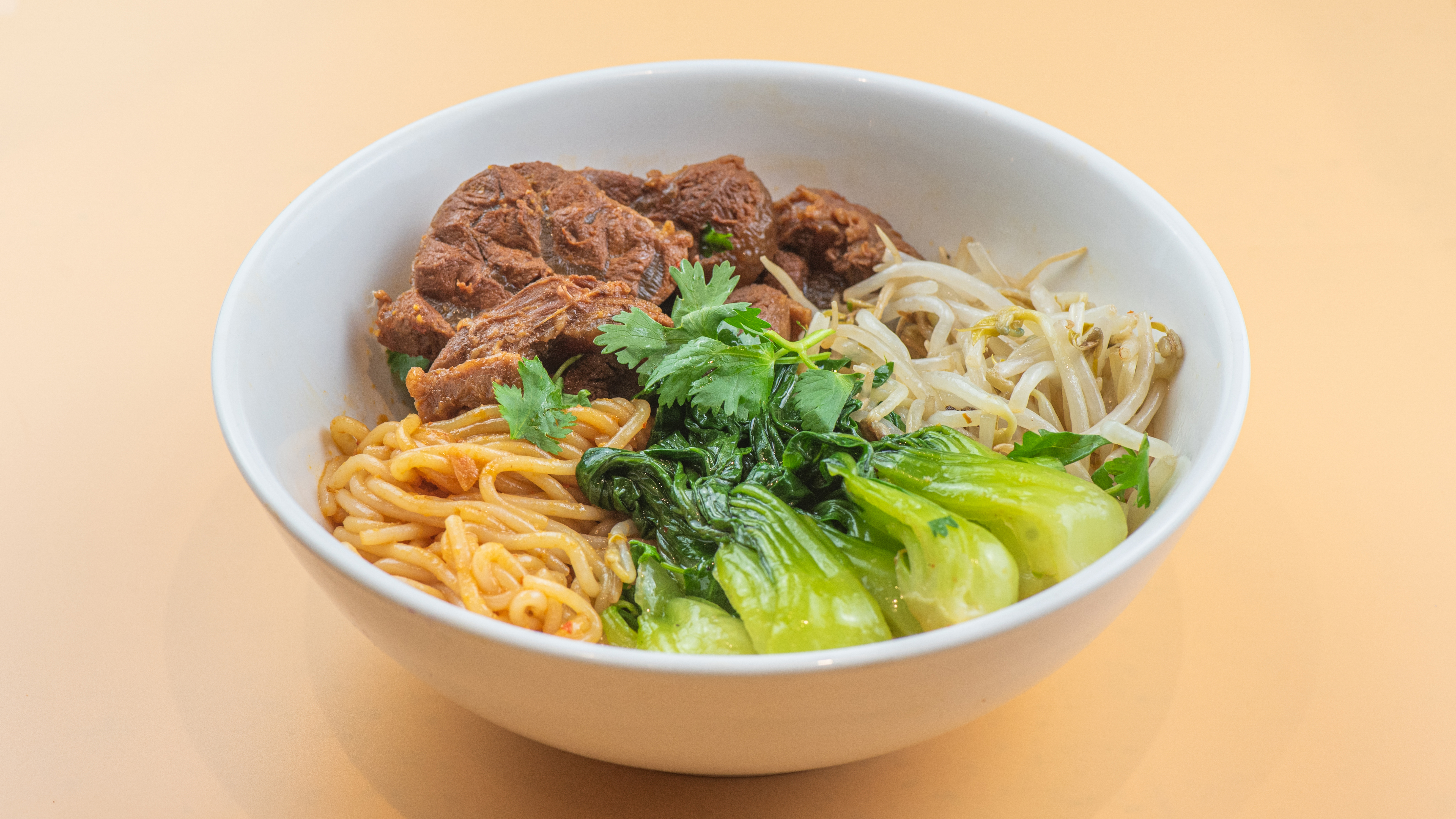 sour spicy rice noodles & braised beef
