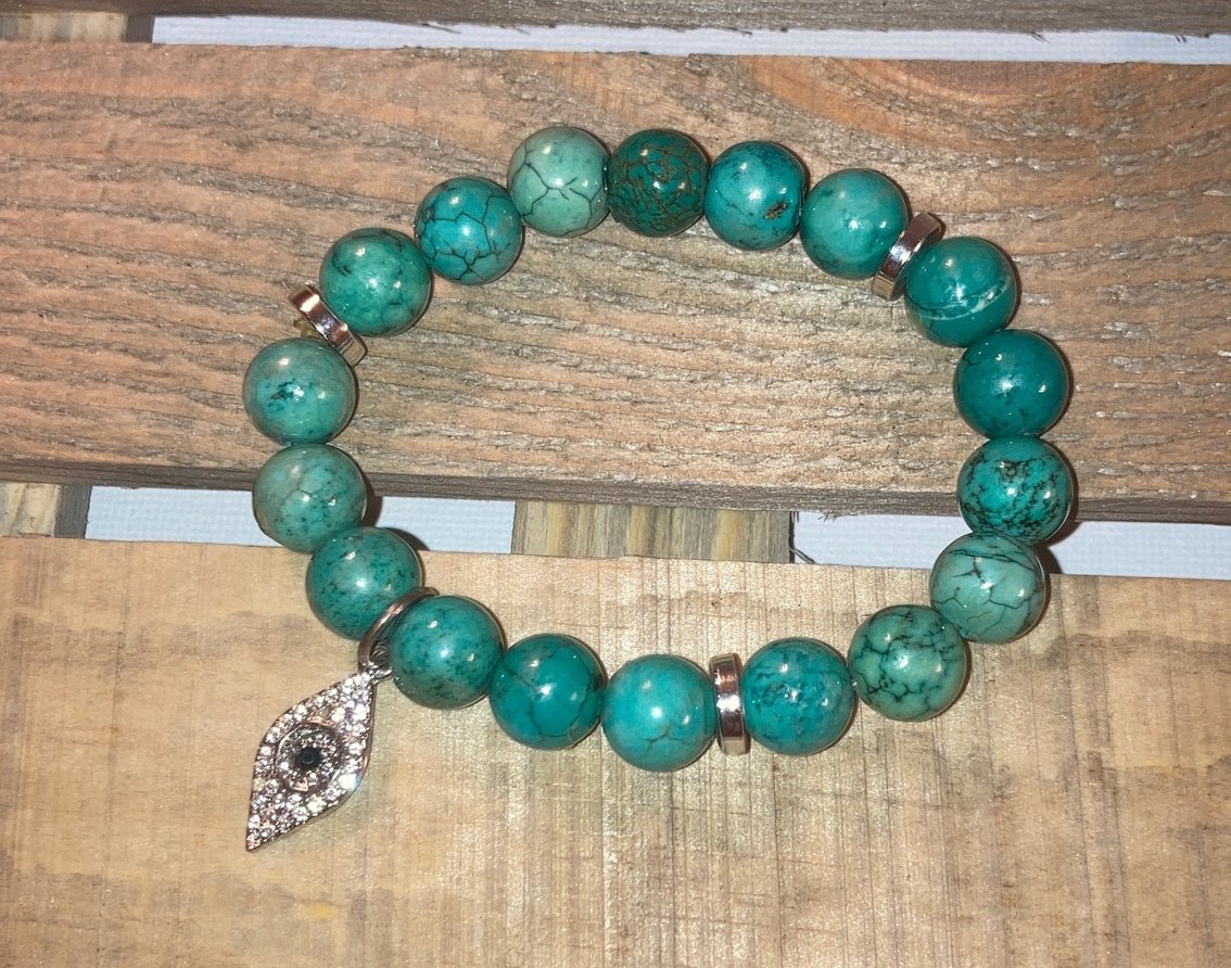 Green stone stretch Bracelet with Lucky Eye Charm