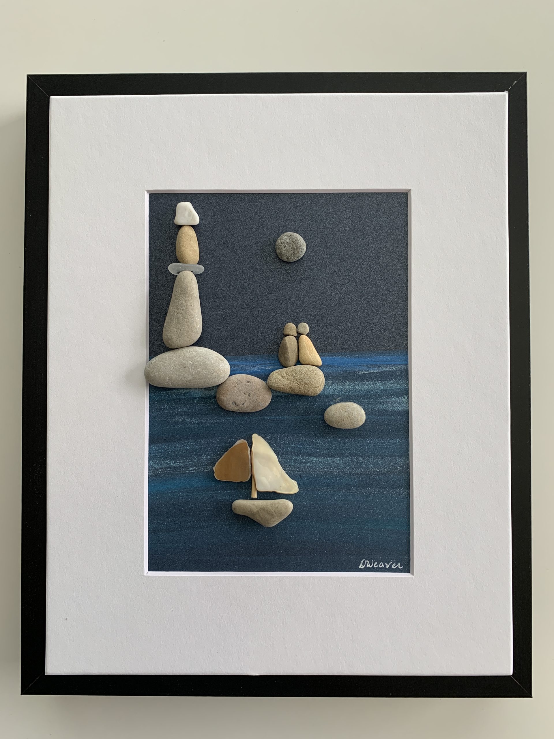 Beauty of Lighthouses- pebble art Lighthouse and sailboat