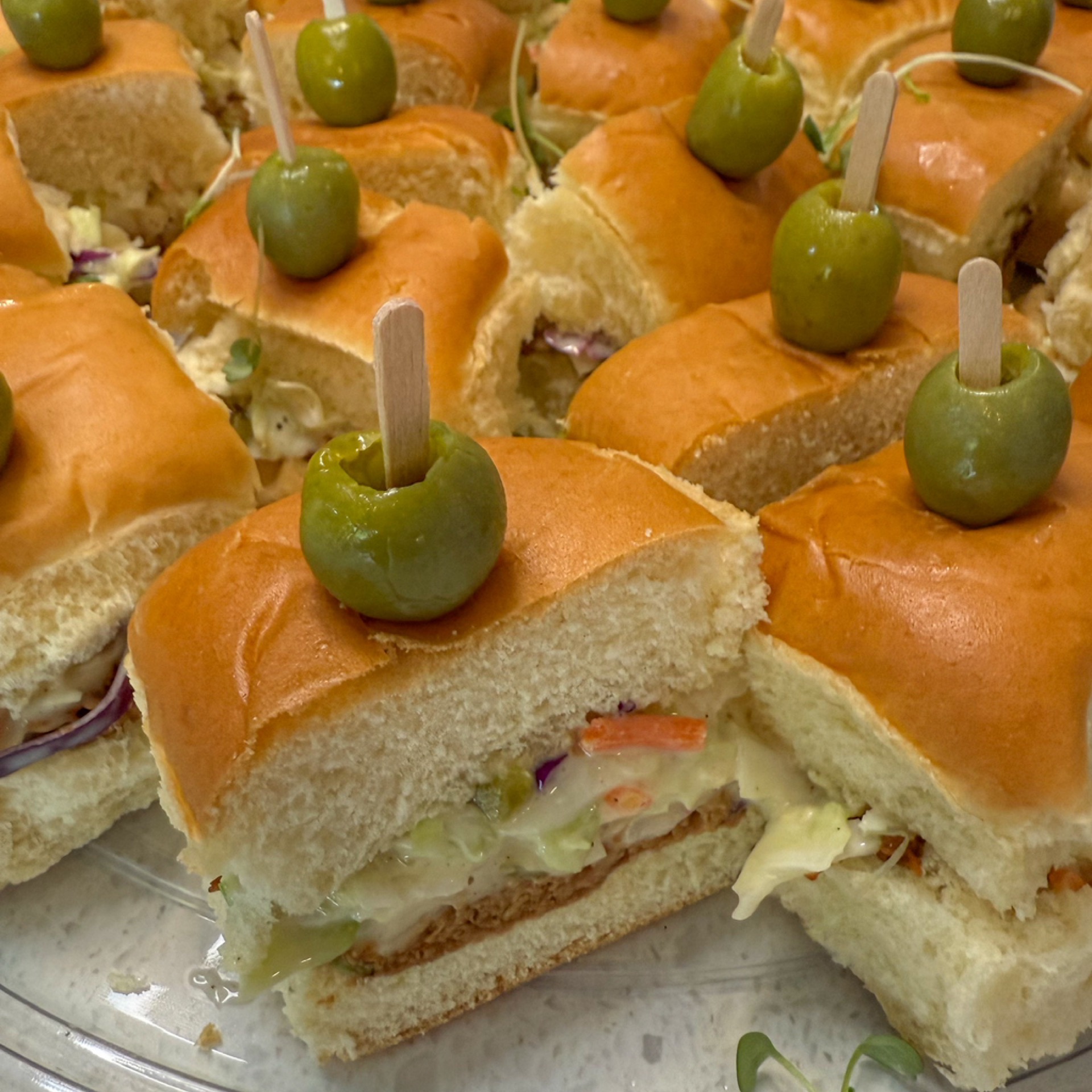 Sandwich platter with homemade BBQ pulled chicken buns & homemade coleslaw and pickle