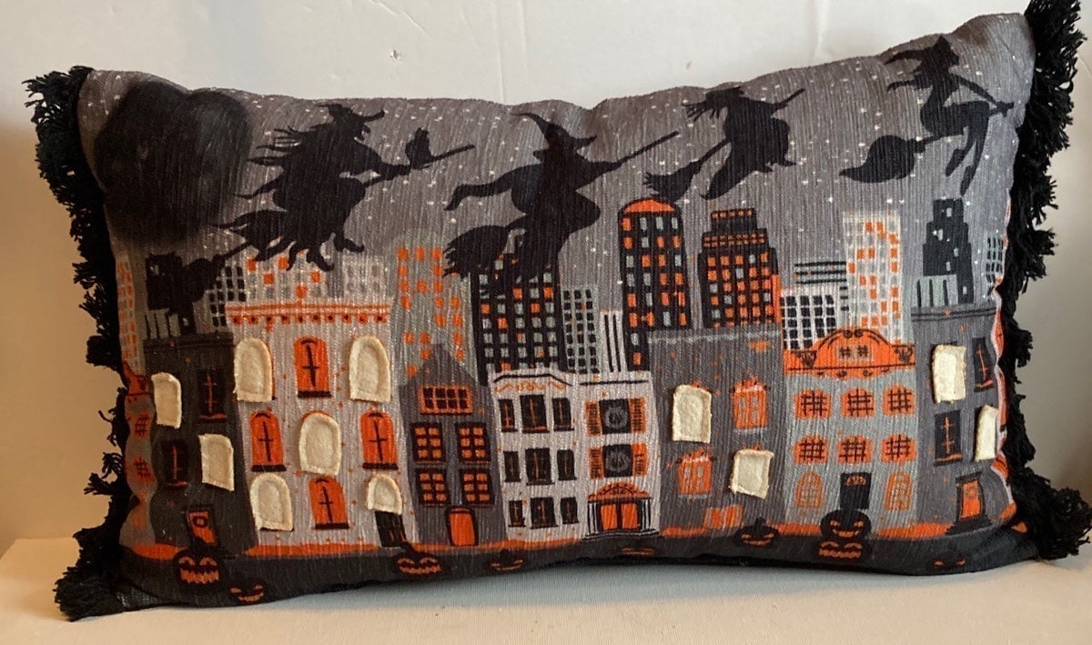 Flying witches over the City Halloween Pillow