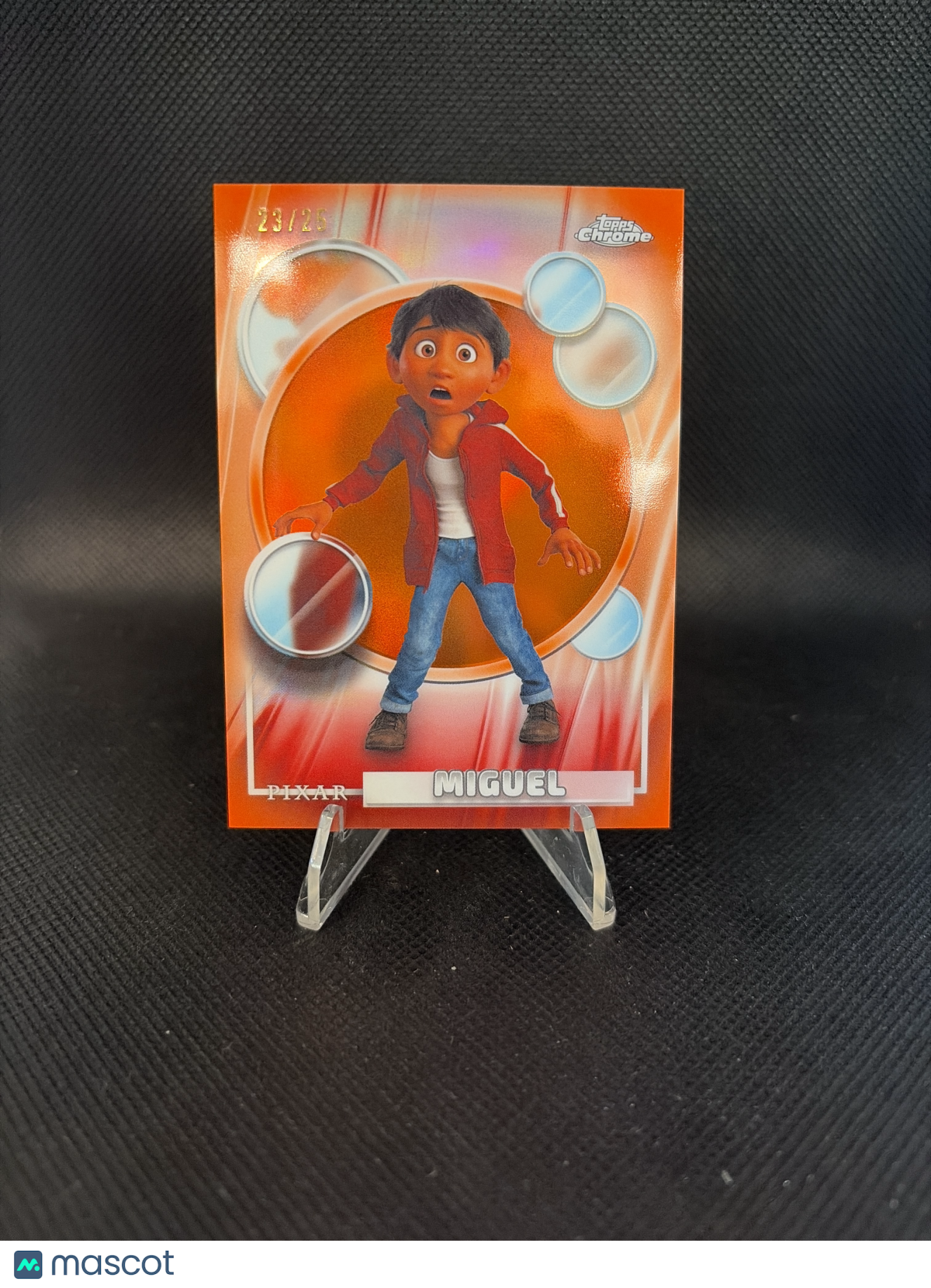 2026 Topps Chrome Disney Miguel True Orange Refractor /25 #122