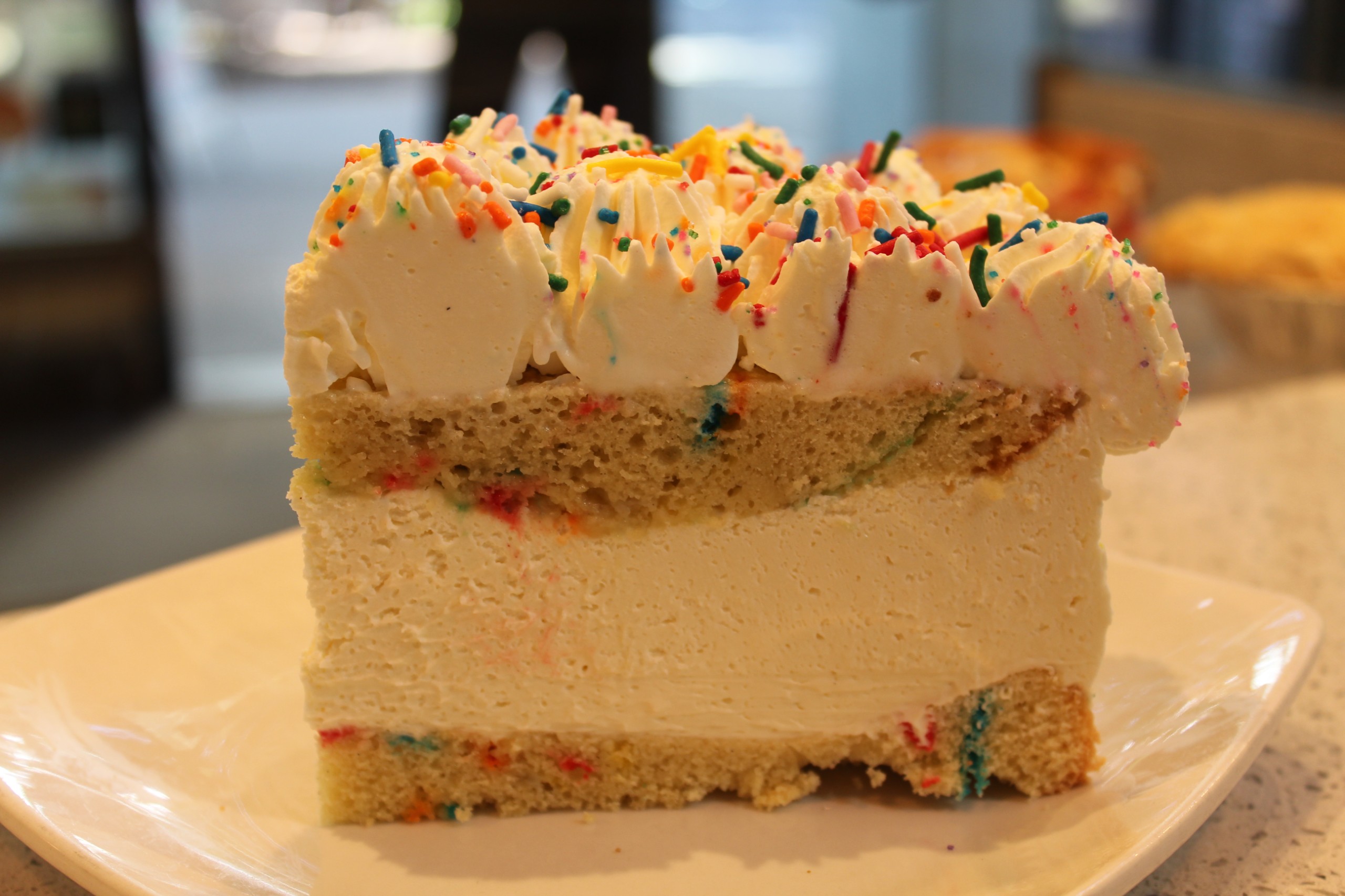 Pride Funfetti Cheesecake - Slice Out