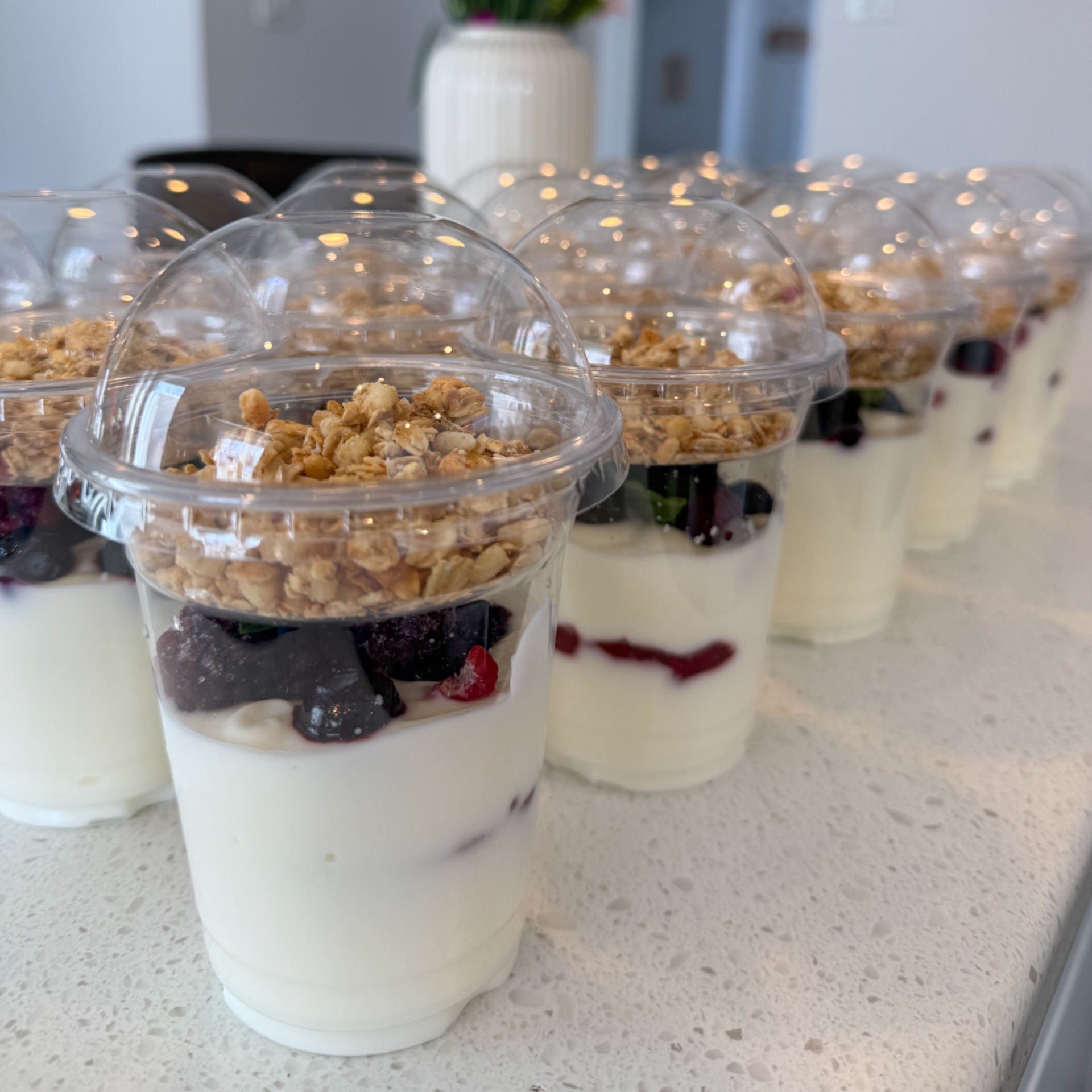 Yogurt with fruit, granola, nut butter and chia