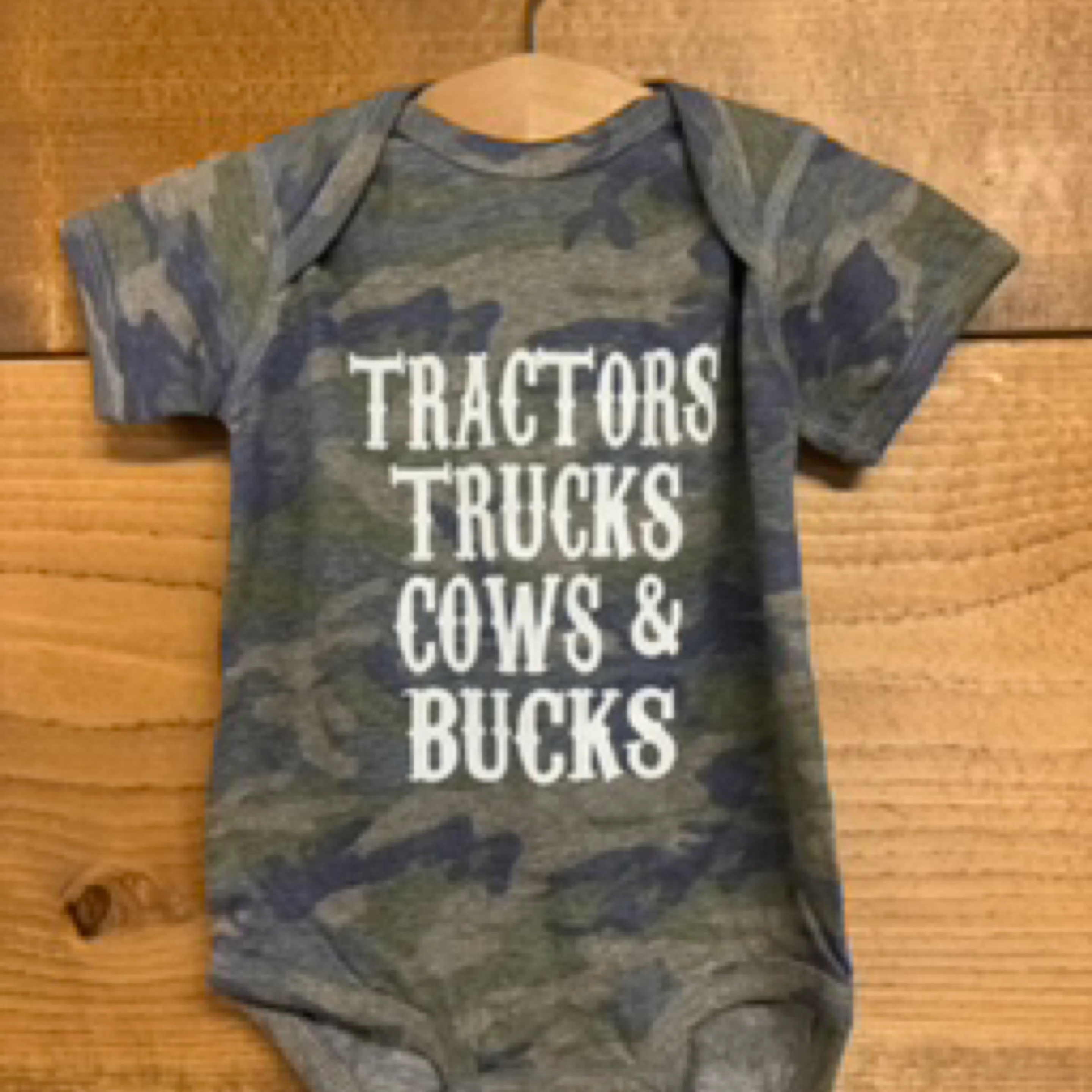 Tractors ,Trucks ,Cows & Bucks Camo Onesie