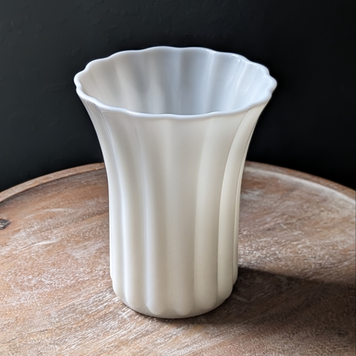 Scalloped milk glass vase