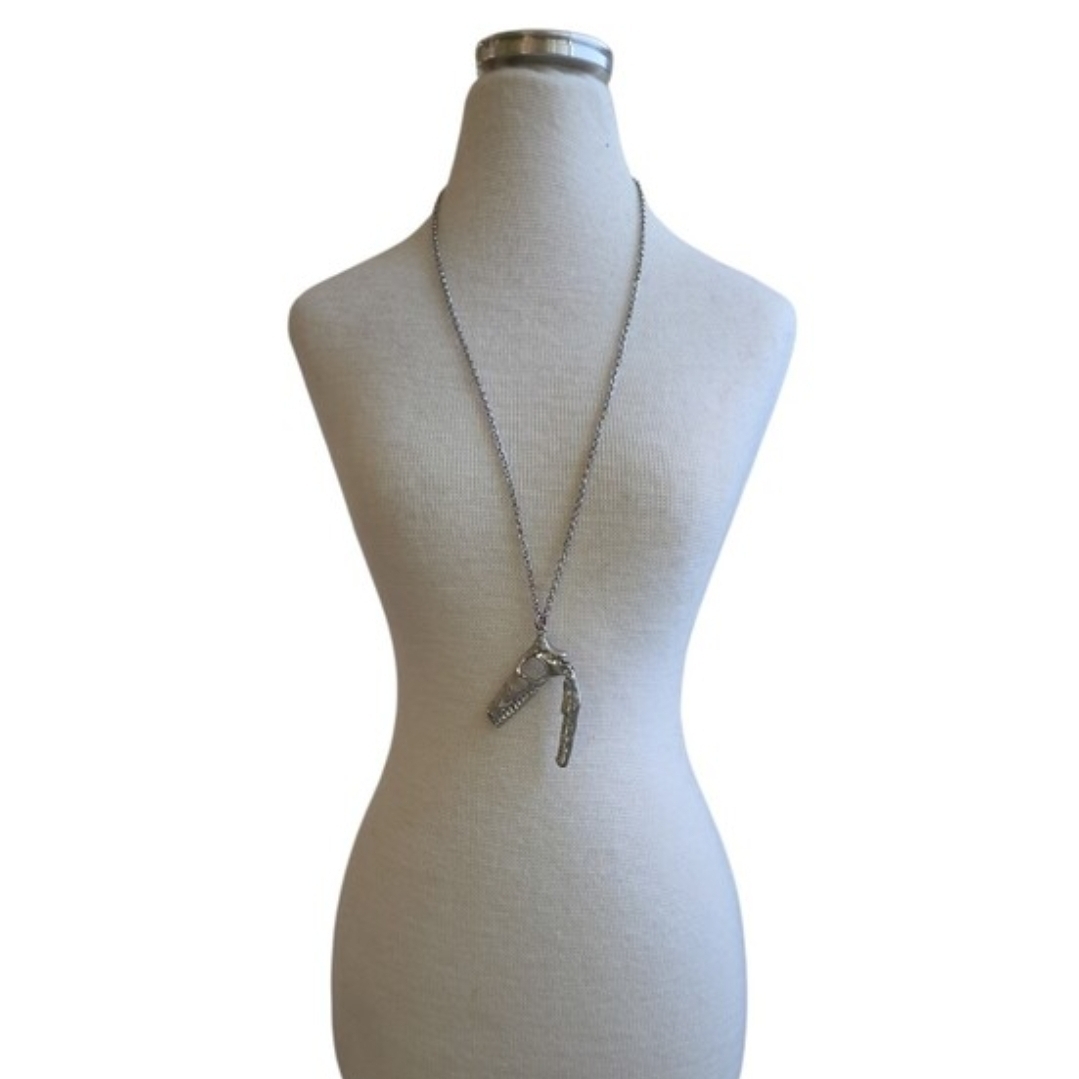Silver Toned Pendant Necklace with Textured Dinosaur 21"