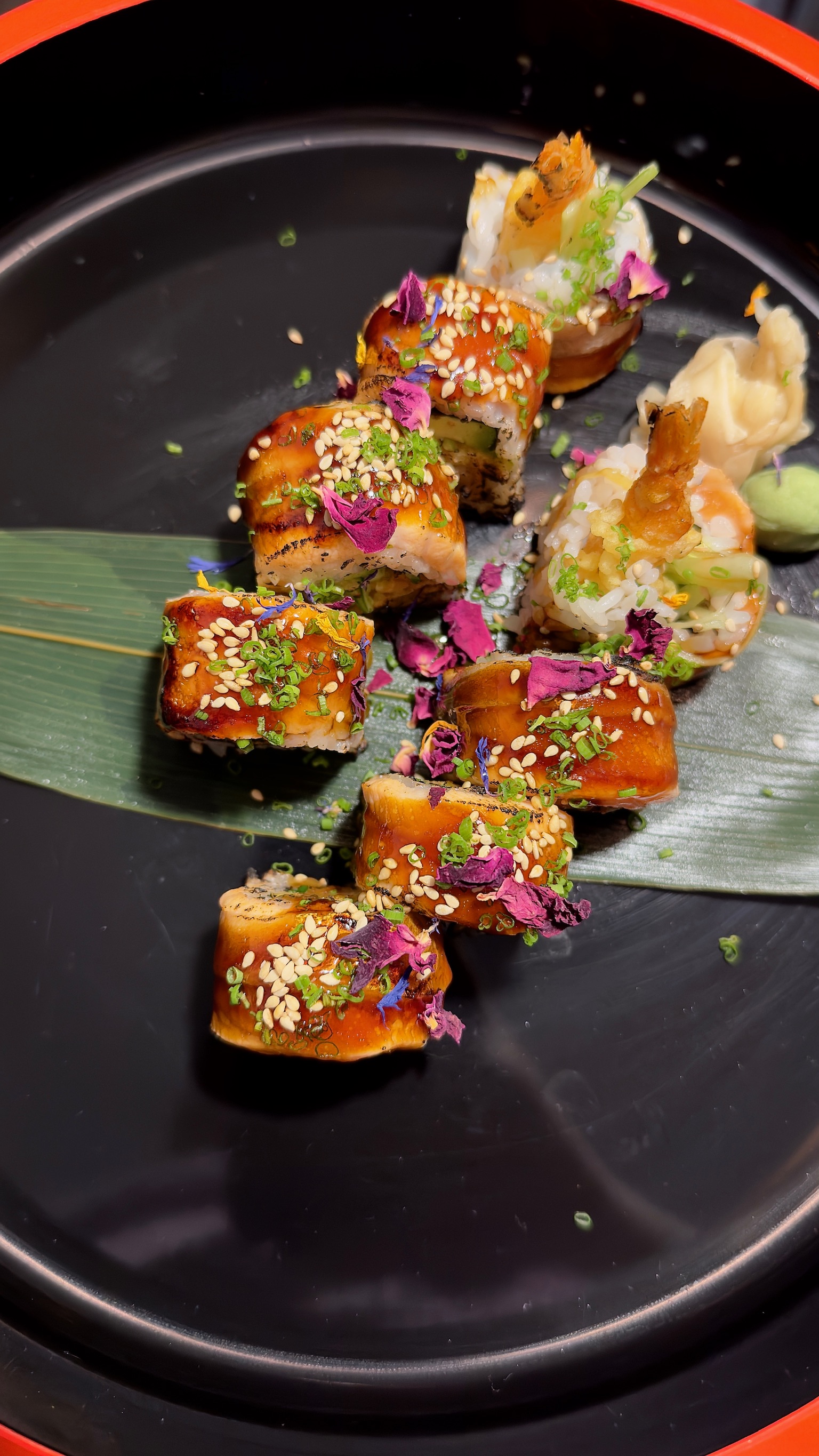 Kira Roll - Our signature roll with crunchy prawn, avocado, an